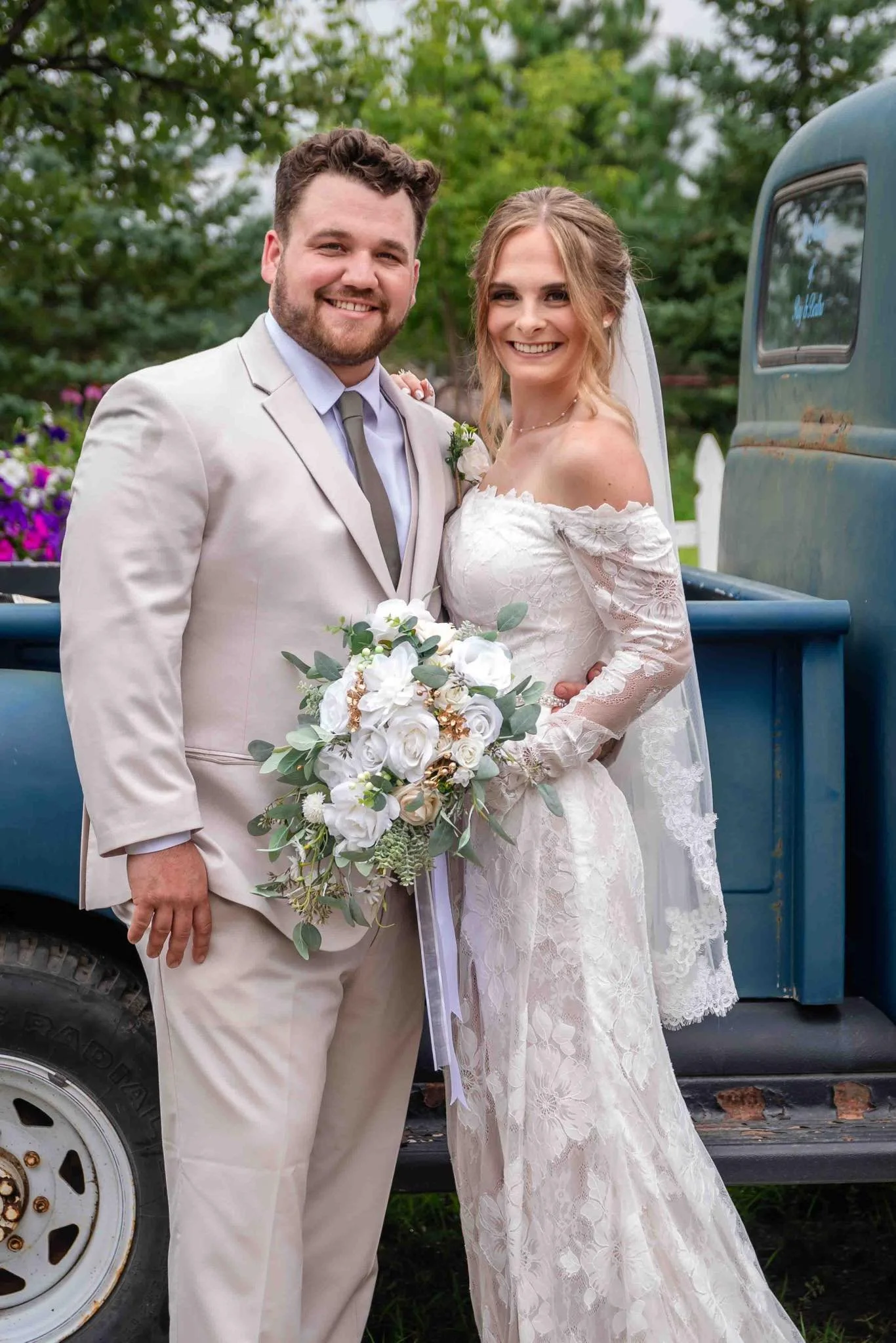 Disney Princess bride & groom in front of a vintage truck at Adler Ranch Wedding Venue, Alexandria MN