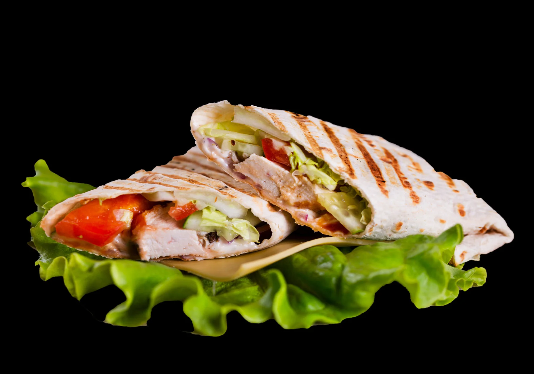 Chicken Wrap Grilled chicken, lettuce, tomato, cheddar jack cheese, bacon, and our homemade ranch dressing wrapped in a fresh garlic tortilla. Served with your choice of steak fries, french fries, onion rings, chips, or Texas Toothpicks. 8.00