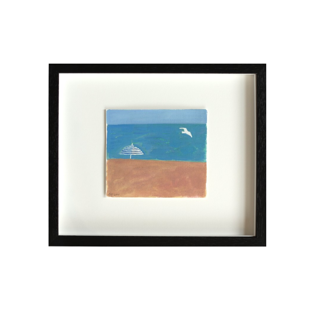 Beach umbrella and seagull