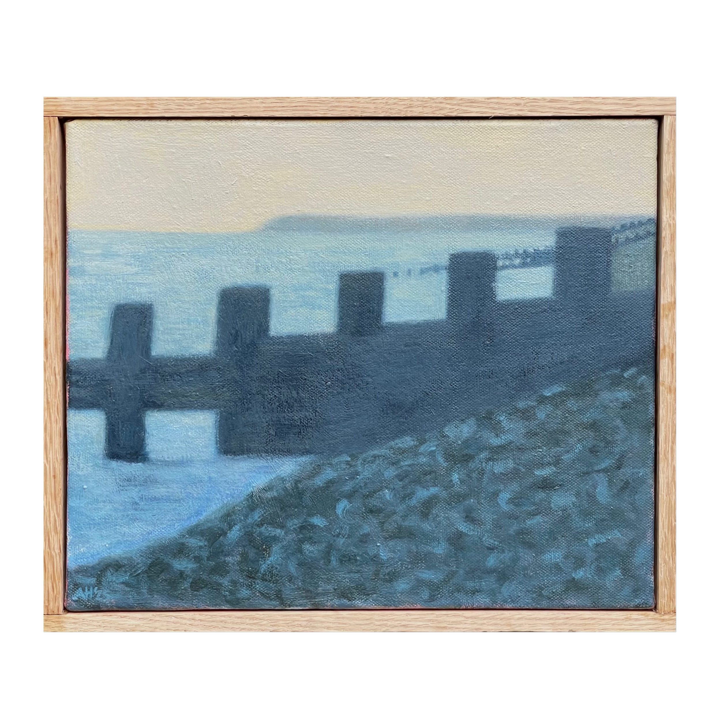 Sea groyne at dusk
