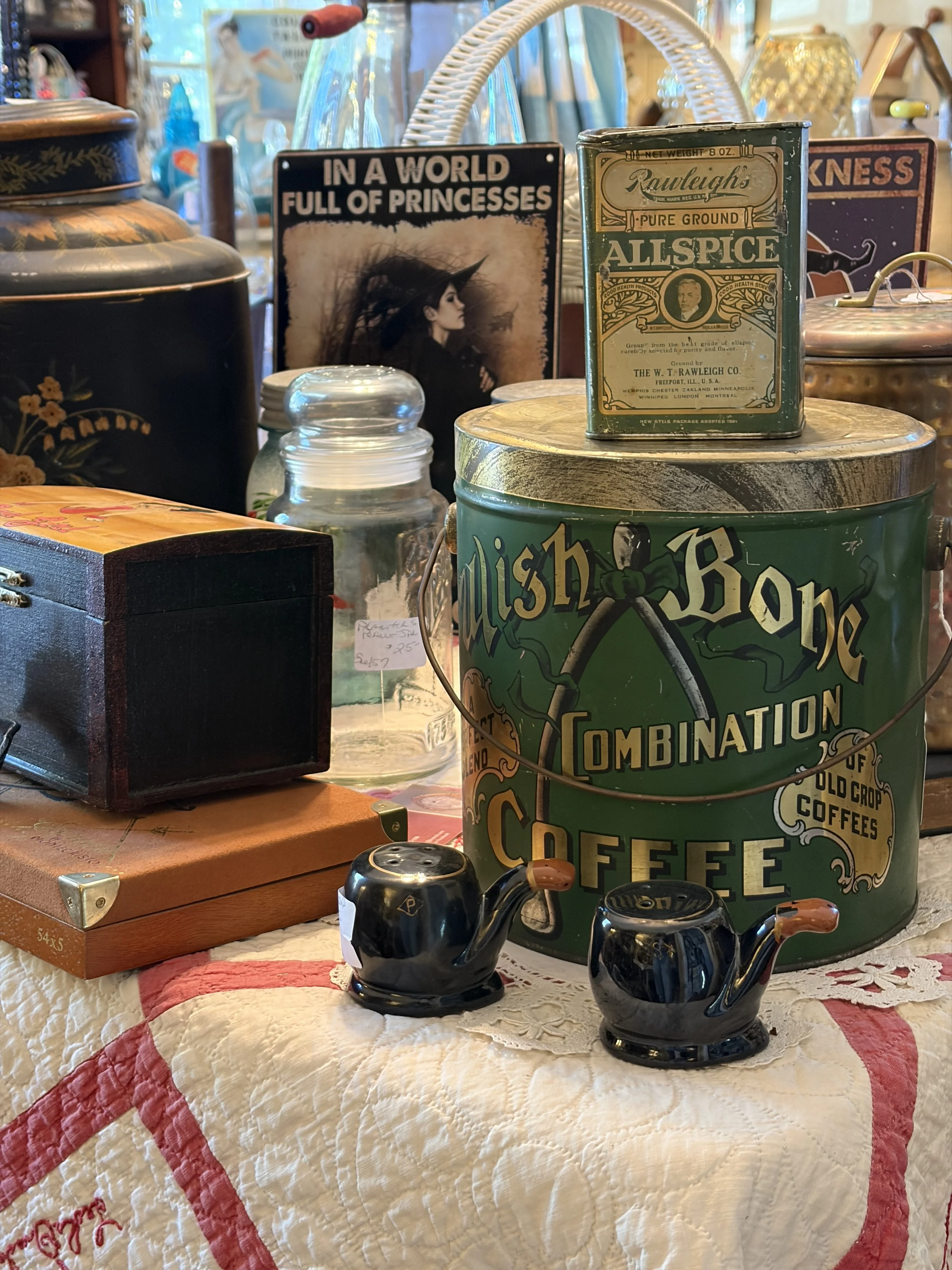 Vintage advertising tins and collectibles displayed at Wexford General Store Antiques in Wexford, Pennsylvania