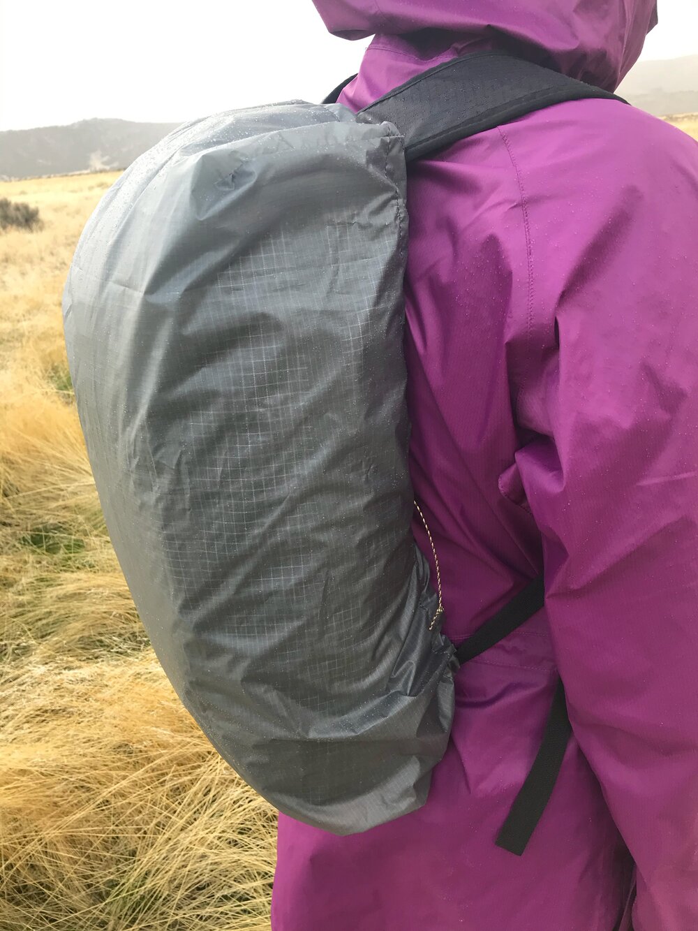 rain jacket that covers backpack