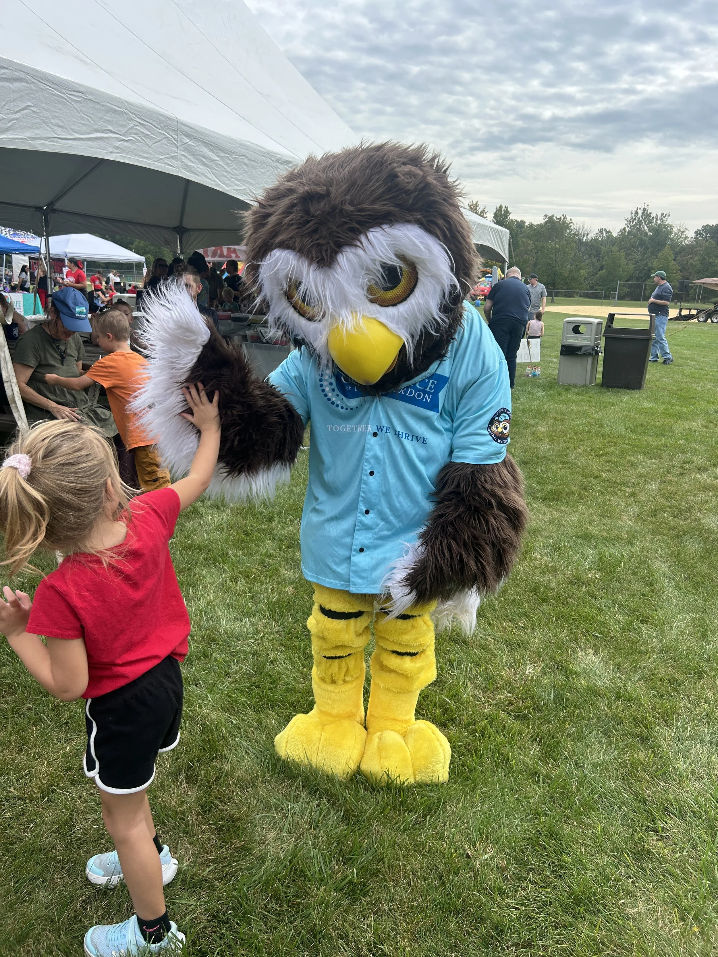 Good- Owlbert giving a high five to little girl.jpeg