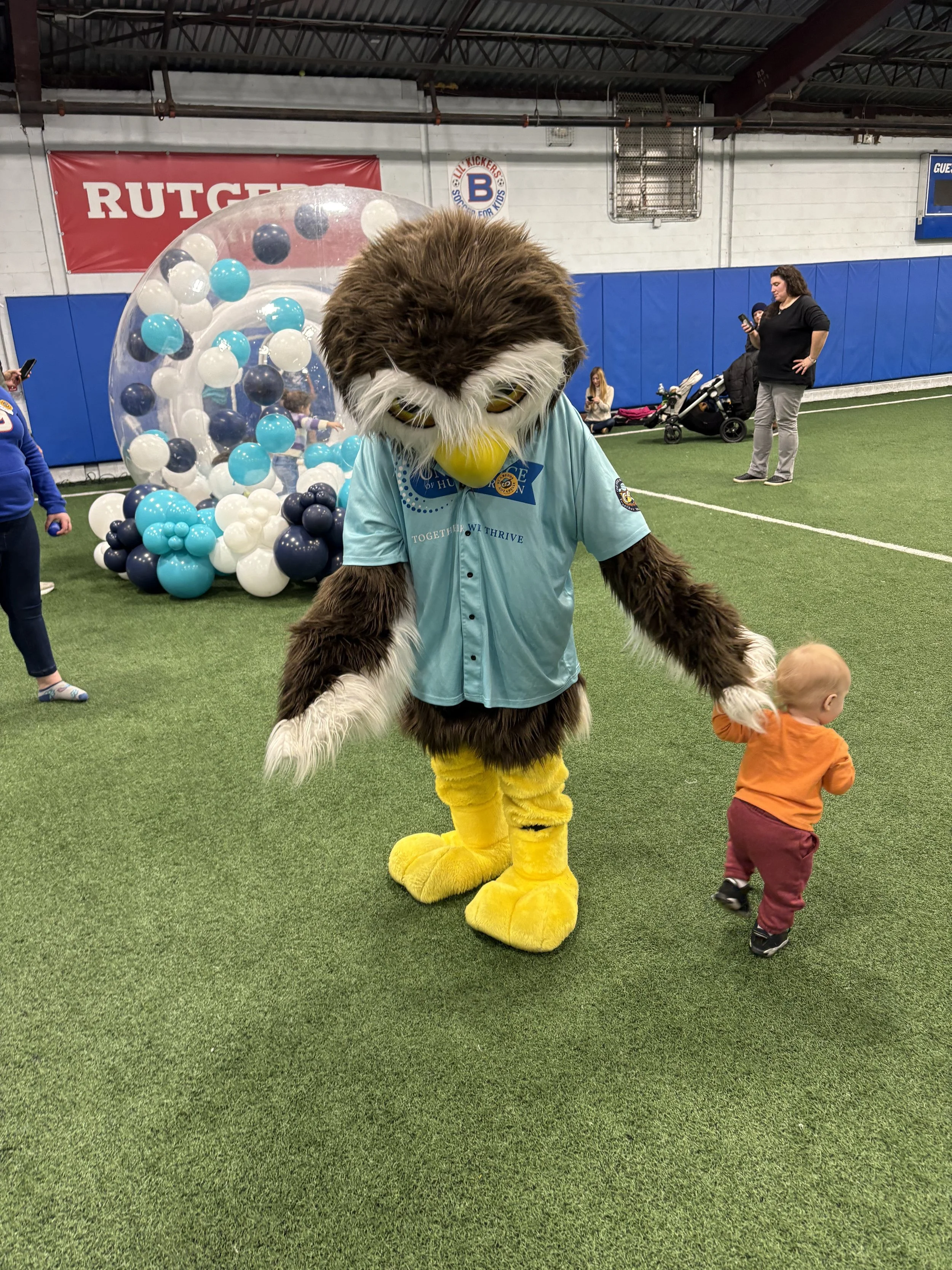 Owlbert with a baby who was OBSESSED with him!.jpg