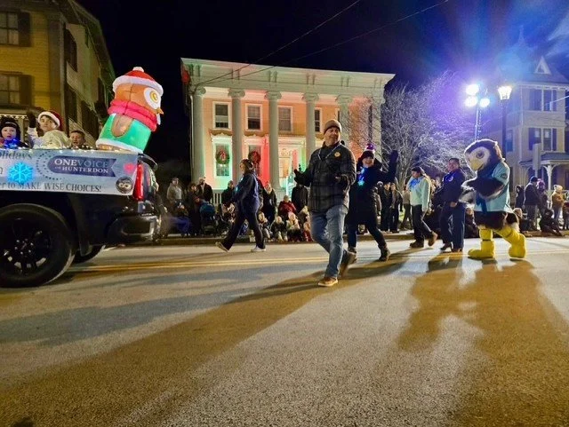 owlbert walking behind truck.jpg