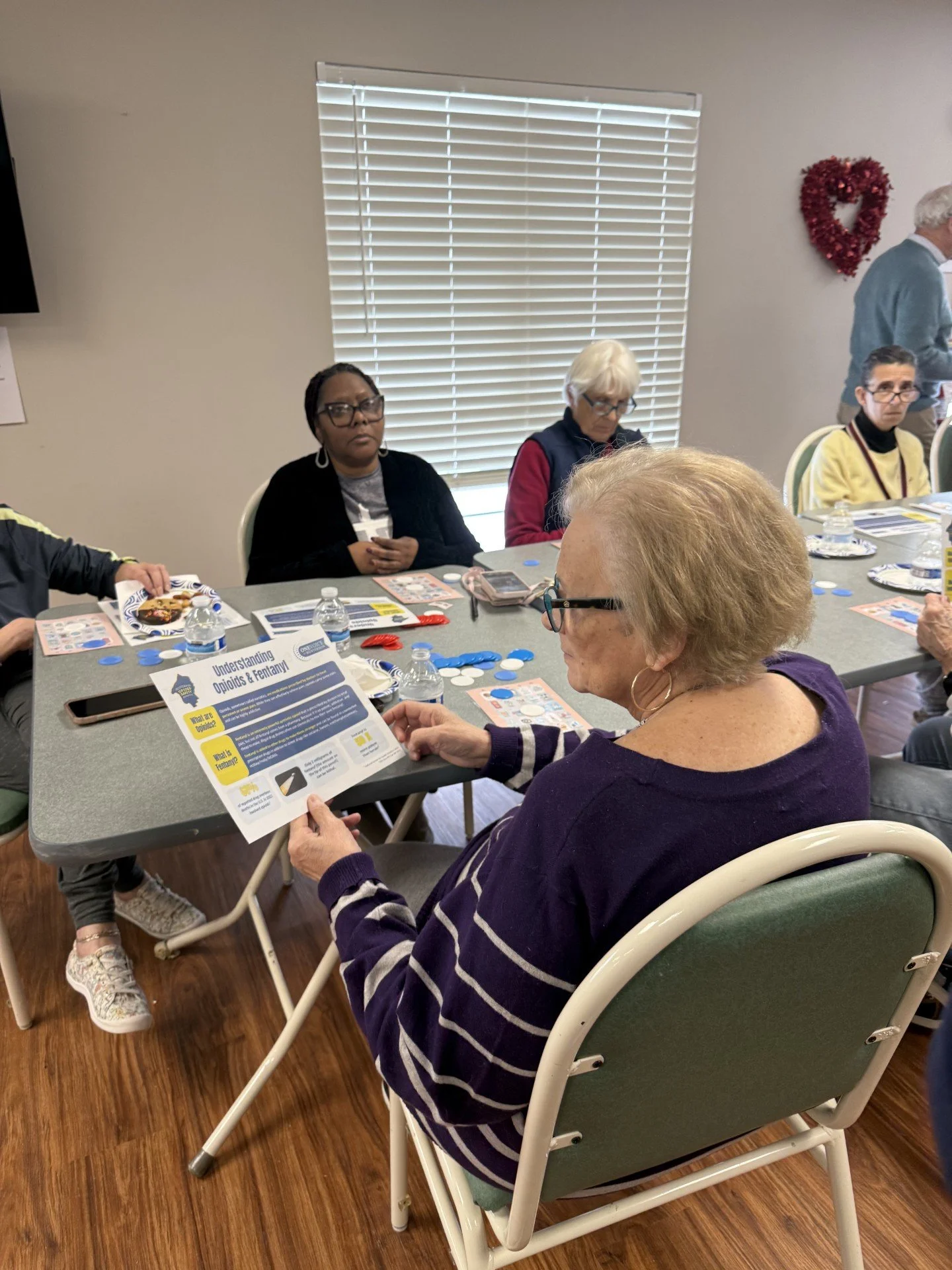 senior looking at opioid info.jpg