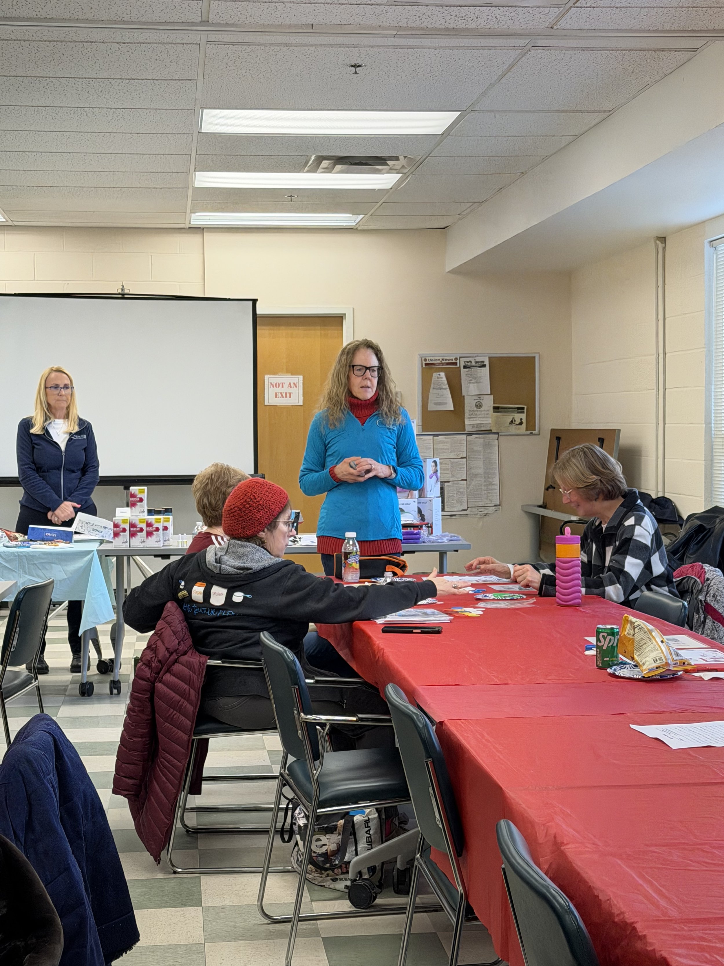 Upclose TL 3 seniors smiling.jpeg