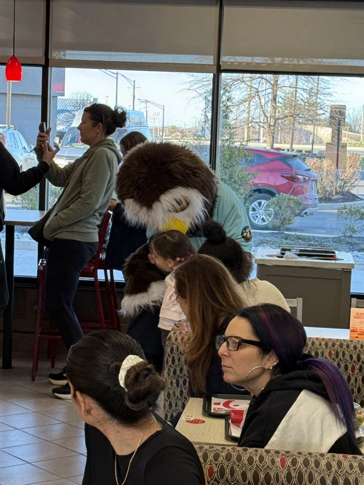 Kids hugging Owlbert.jpg