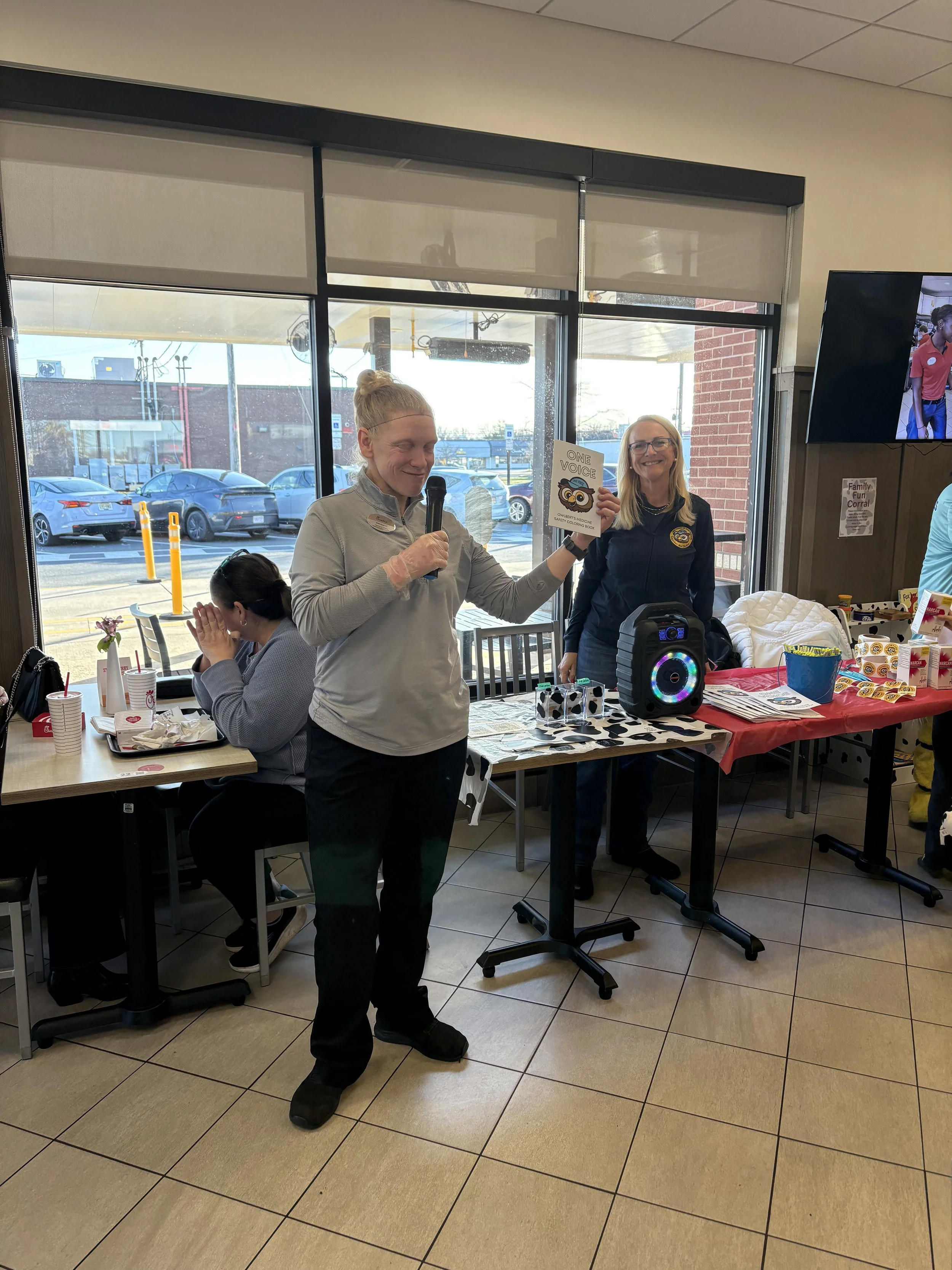 Melissa Hoffman with our book.jpeg