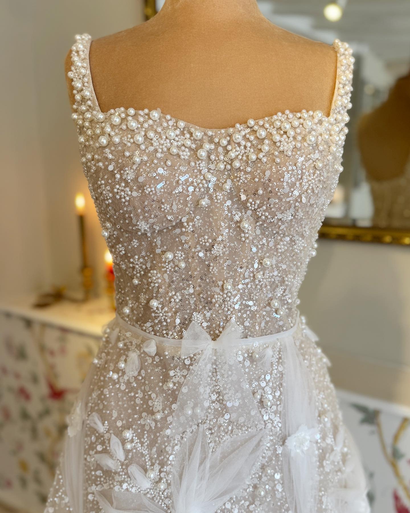 T H E L M A 

When more is just more! One for all of you sparkle lovers out there ✨ 

A true masterpiece of opulence and elegance, adorned with a lavish display of beads, pearls, and enchanting 3D floral appliques.

Brand new in as part of our incred