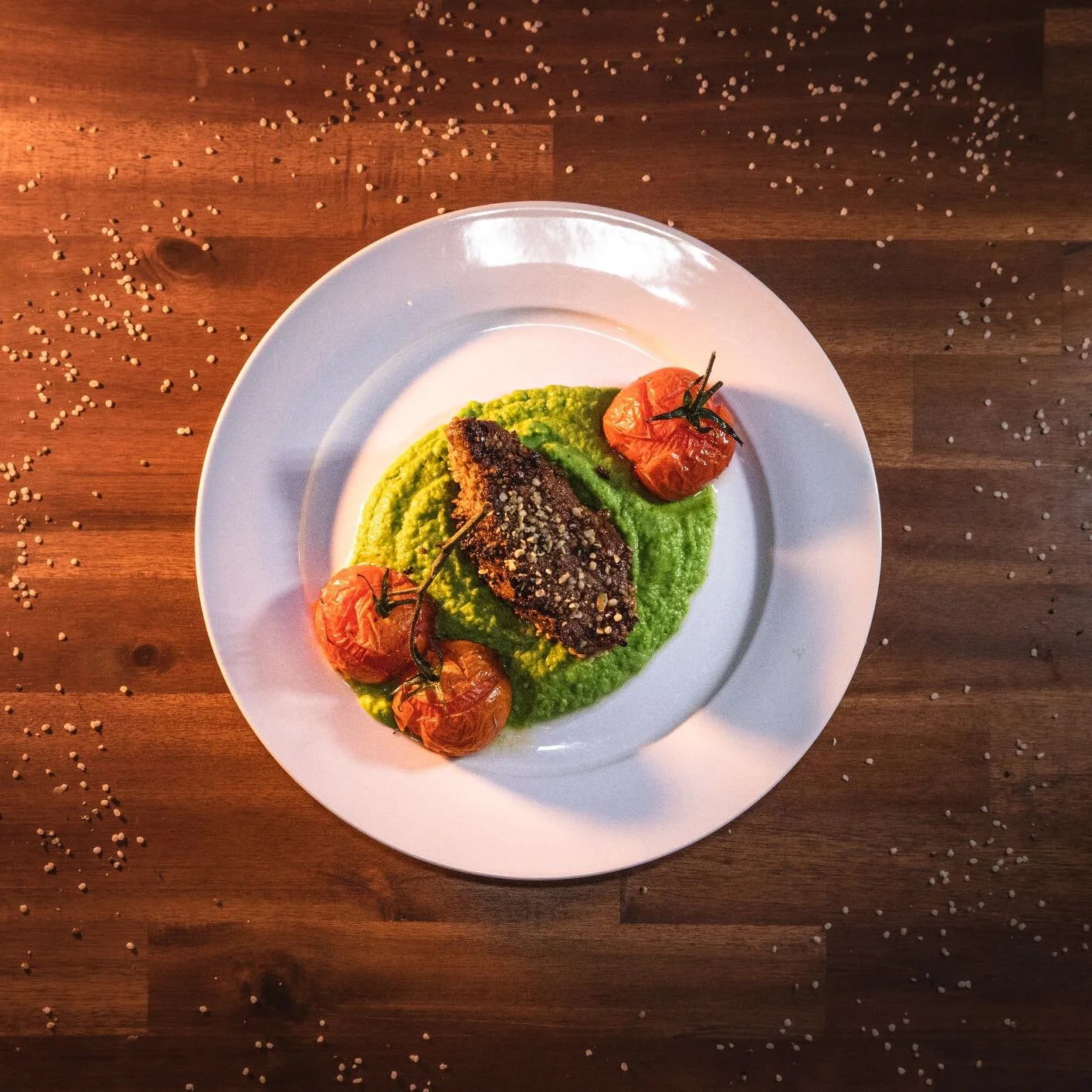 hemp-crusted-lamb-with-pea-puree-and-cherry-tomato.jpg