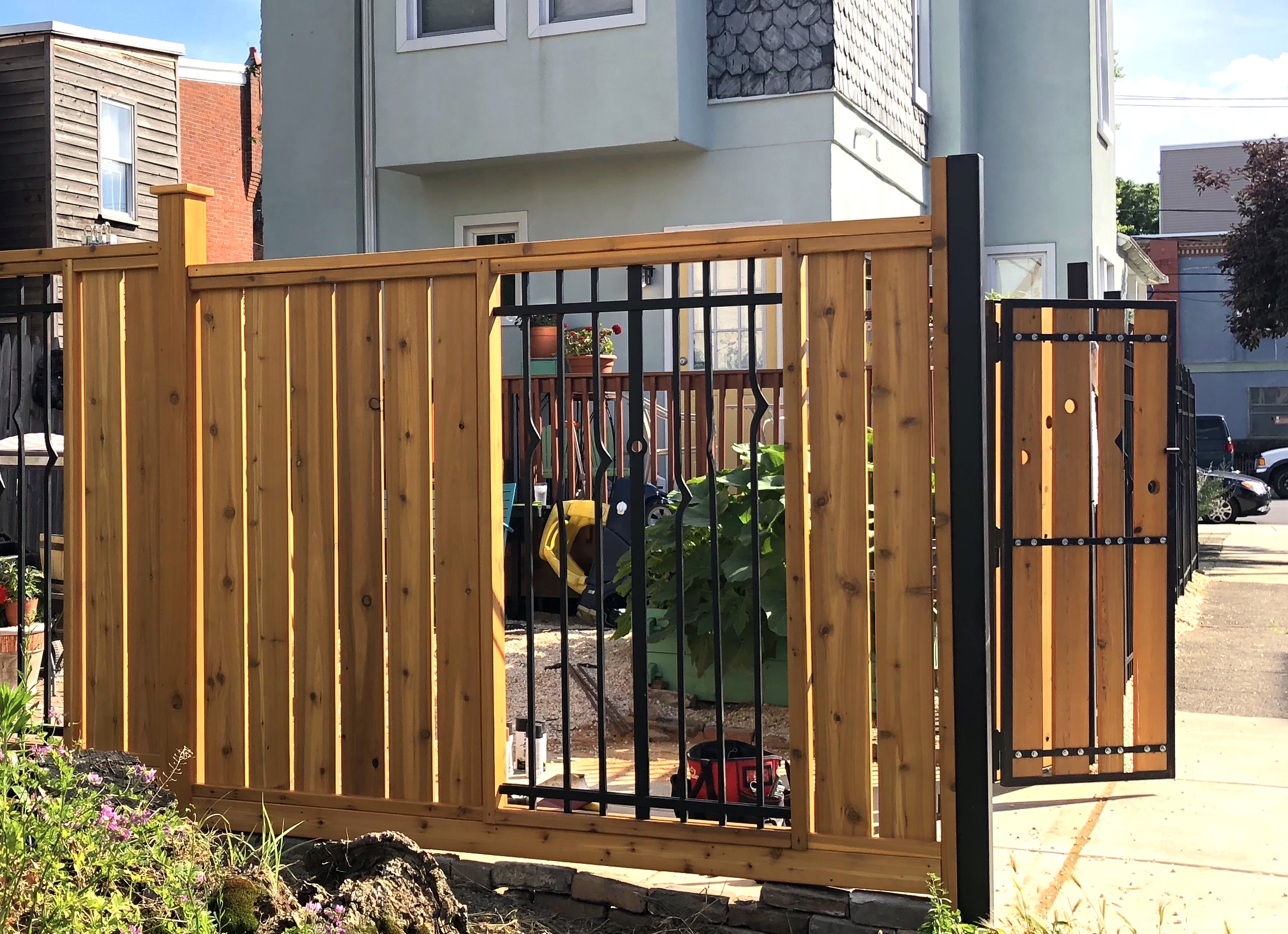 FORGED IRON FENCE WITH CEDAR DRIVEWAY GATE - private residence, Pentridge St., Philadelphia PA