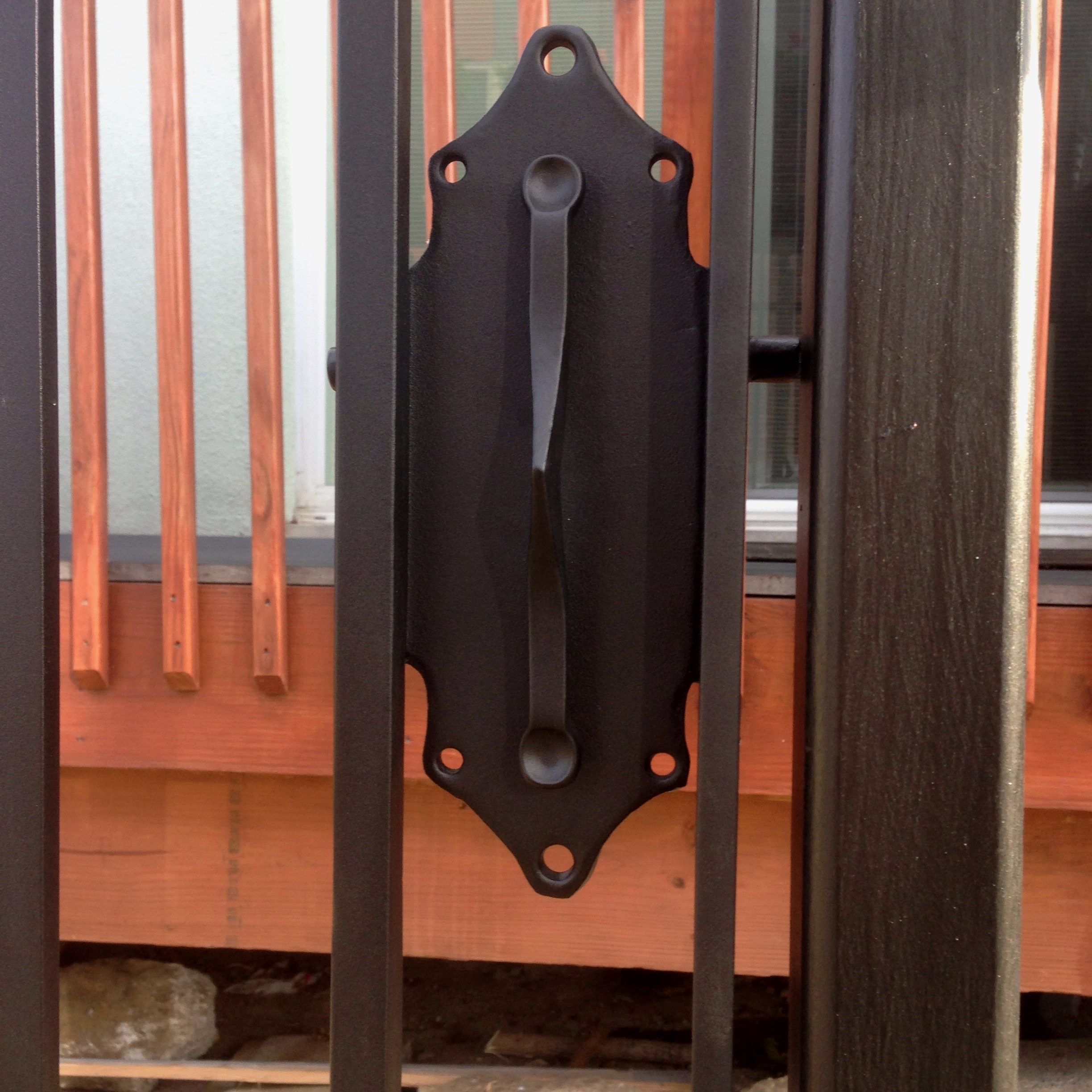 FORGED IRON FENCE (detail of lock plate)