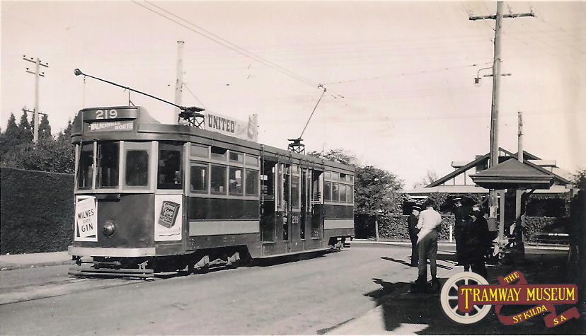 F type 'drop centre' tram 219 in Tuscan and Red at the Hyde Park terminus at the intersection of Whistler Avenue and Cross Road before running inbound to the City and eventually through to Walkerville North, July 1951.