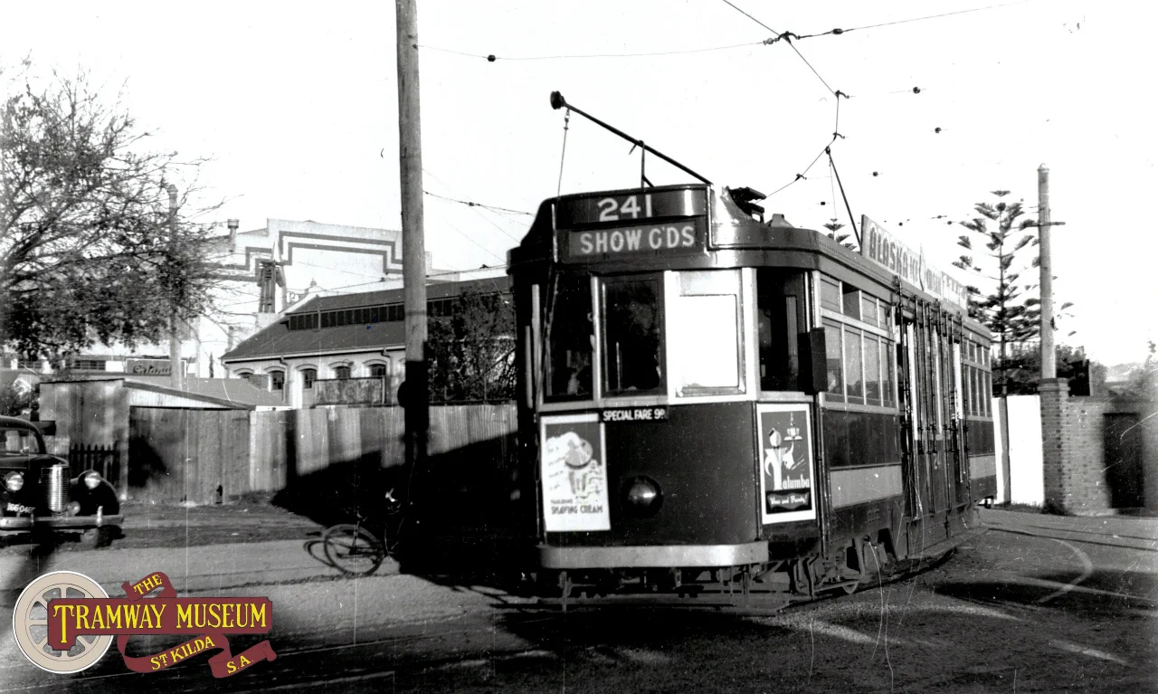 F type 'Drop Centre' tram 241 leaving the Wayville Showgrounds on another trip back to the City to collect another load of passengers bound for the showgrounds. The former Centennial Hall can be seen in the background to the left. Today, the present Jubilee Pavillion and Ferris Wheel would dominate the background of this scene.