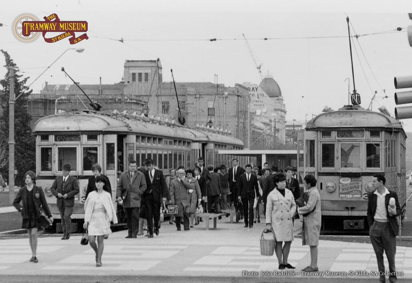 Happy #ThrowbackThursday!

Victoria Square, the city terminus of the Glenelg line, as pictured in 1973. 

The coats and cardigans are out in force during the morning rush as commuters alight from the H-Type trams on their way to work. At this point i