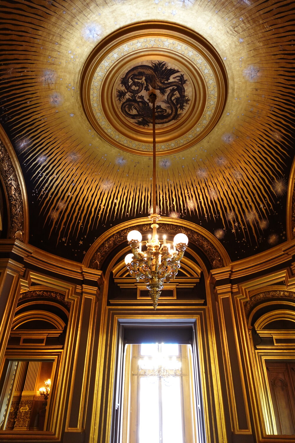 Sun-like ceiling of a ballroom in Palais Garnier