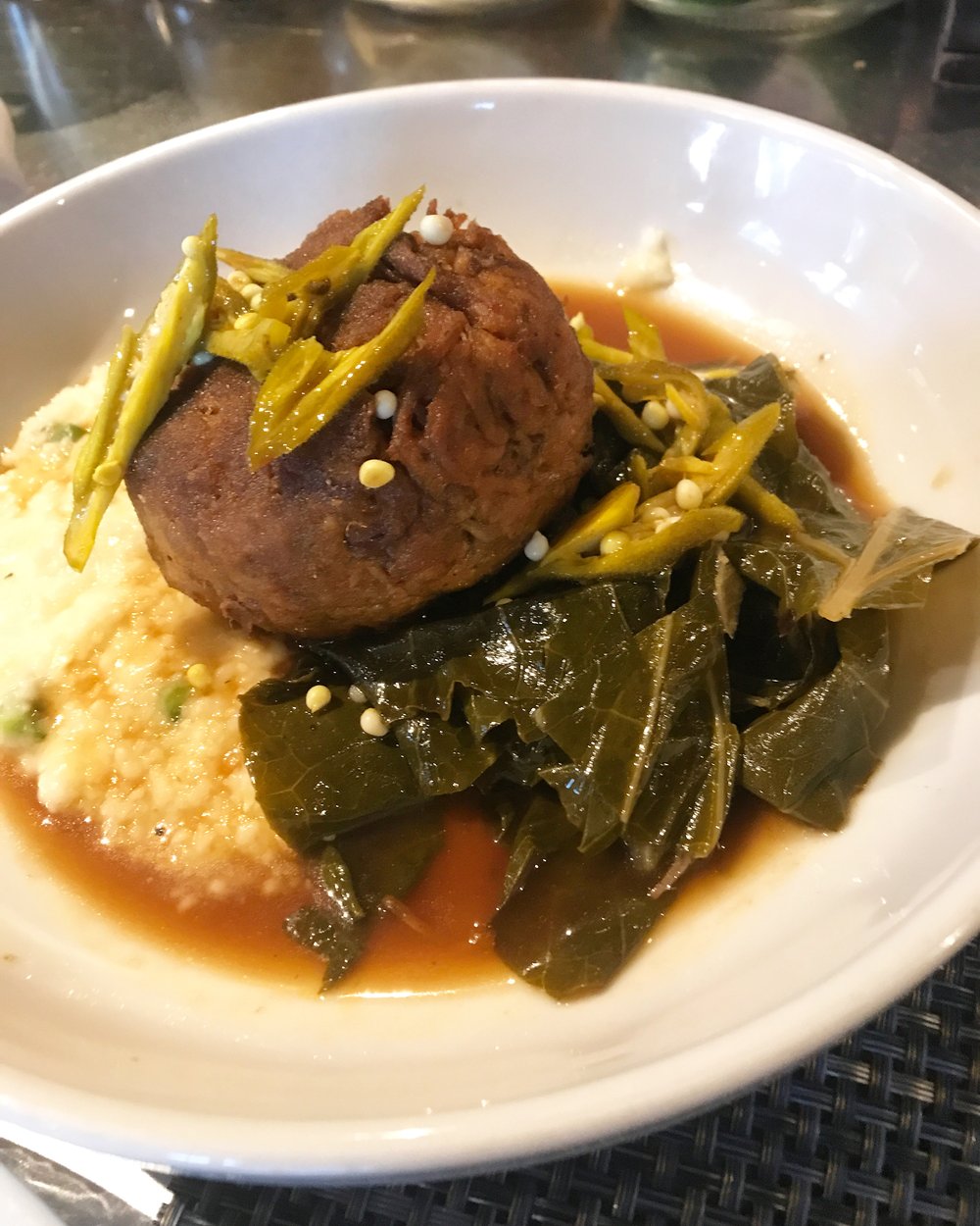 Pulled pork with picked okra, collard greens, and cheesey grits, Cochon Butcher NOLA