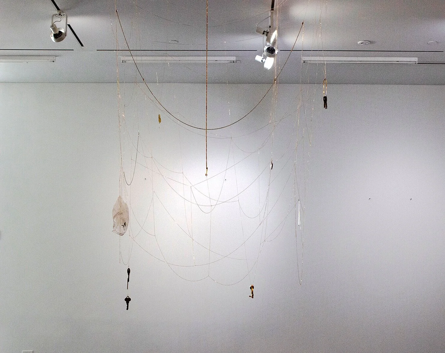 a cup at my feet. i sit still