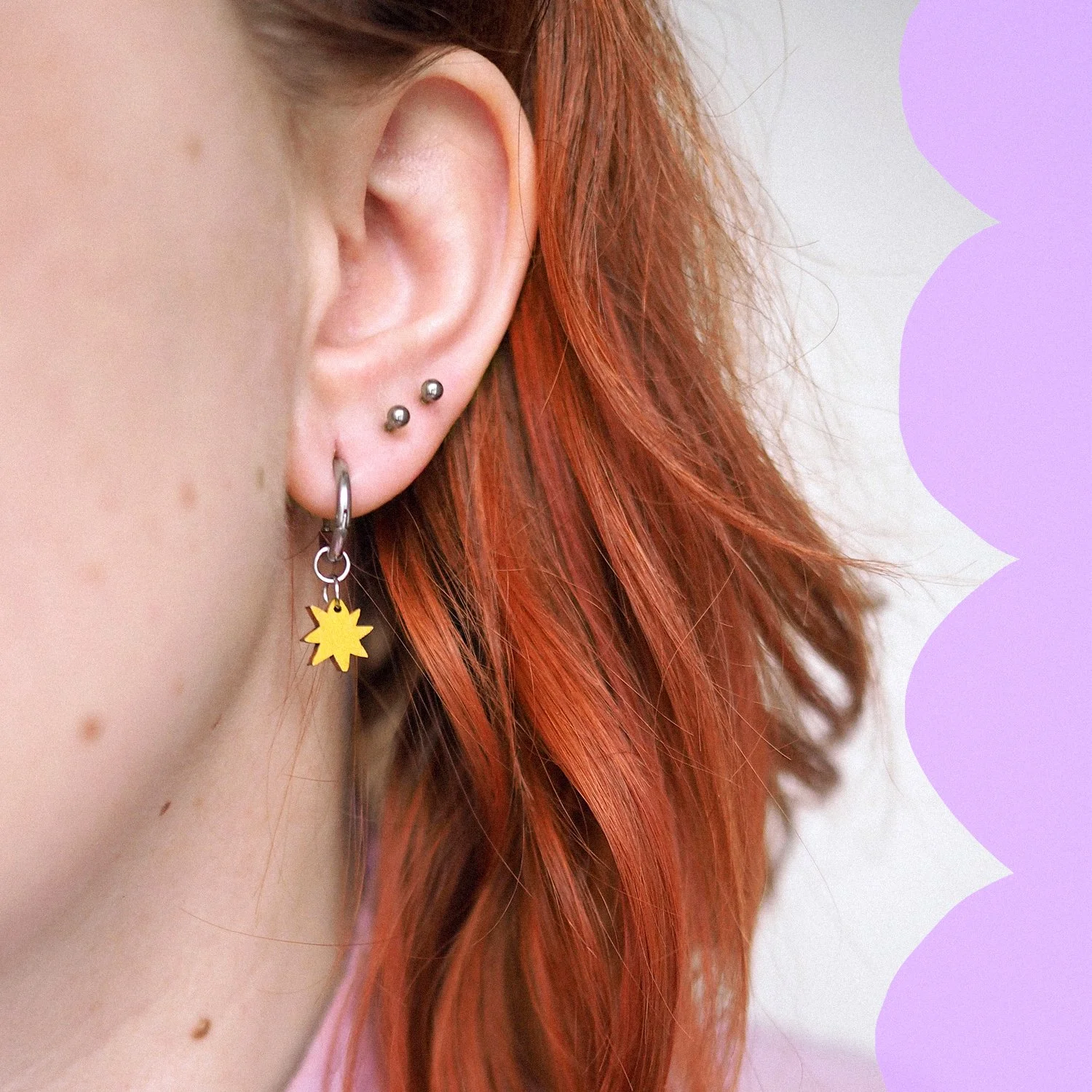 tiny star wearing 2 square small.jpg