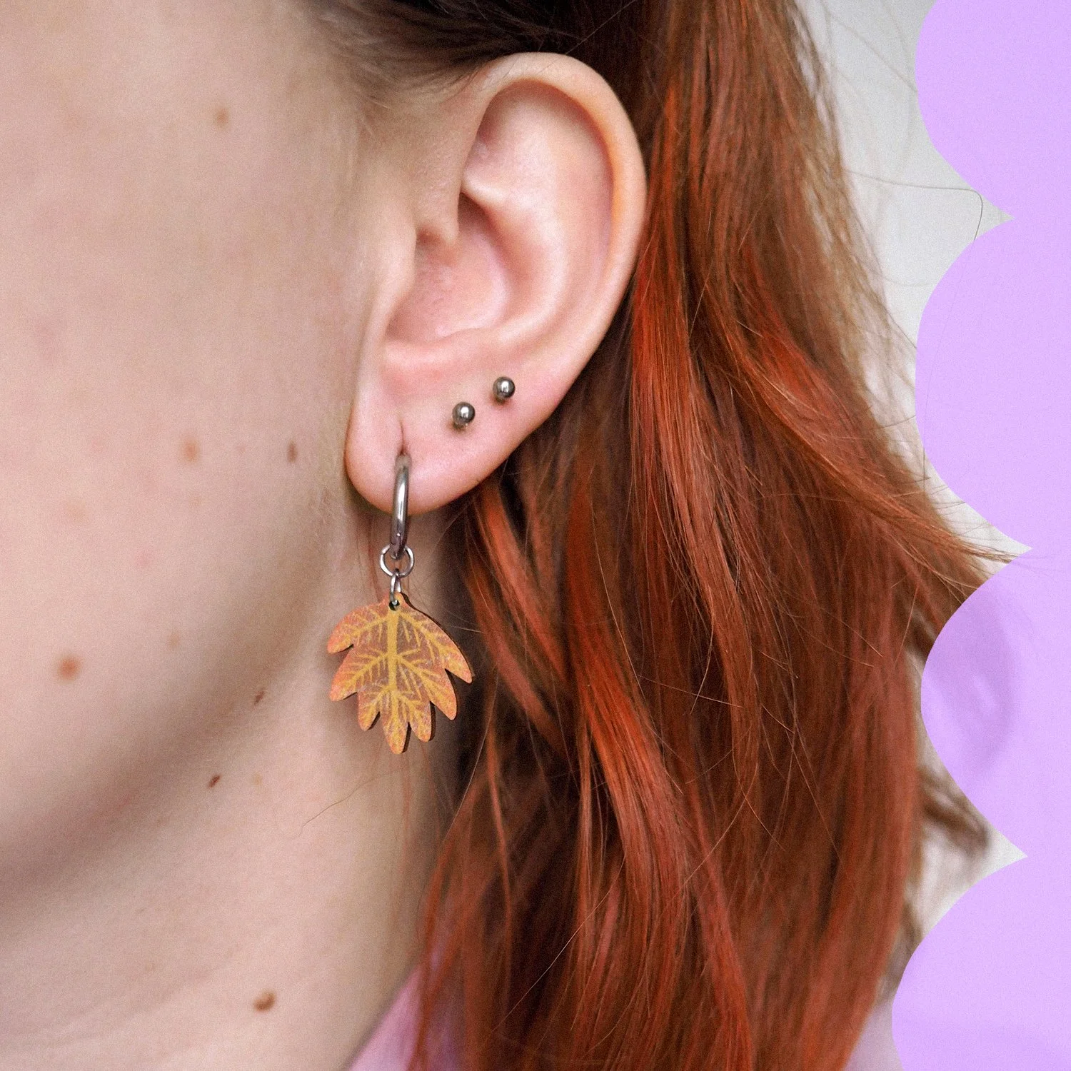 leaf red wearing small.jpg