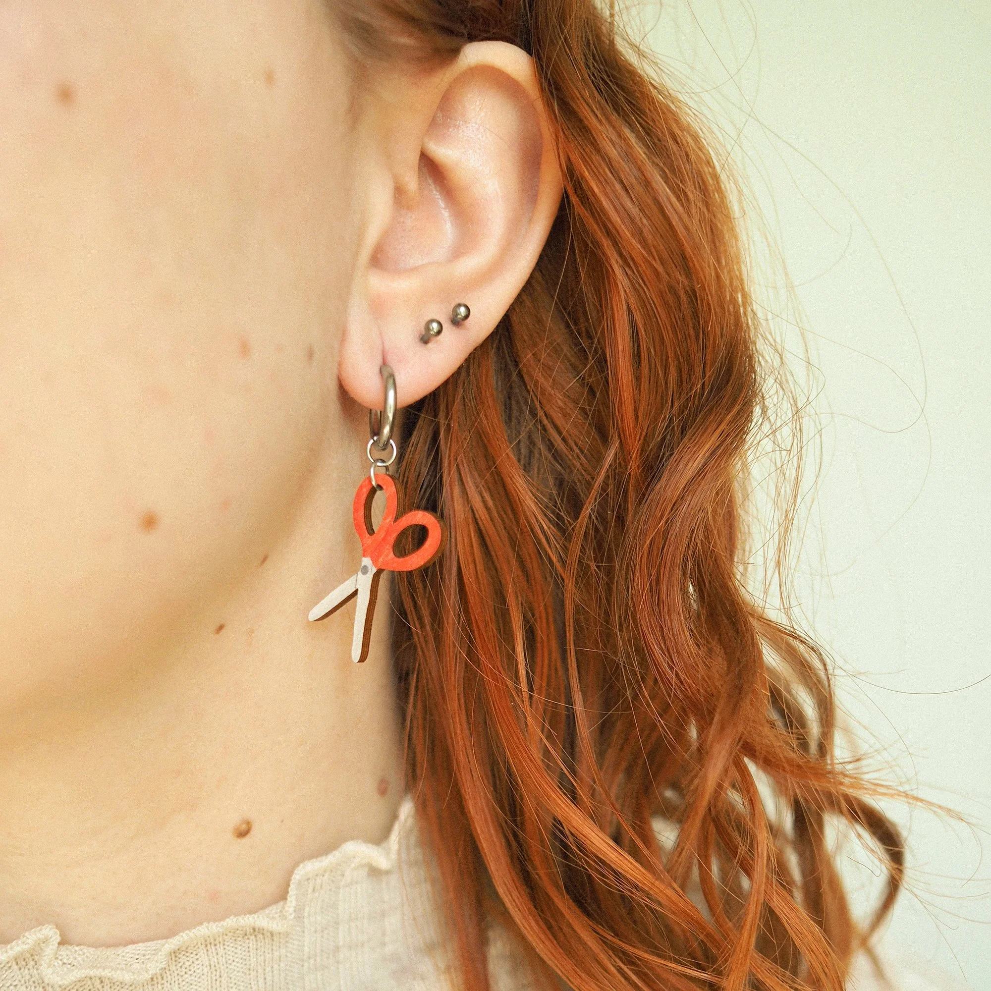 red scissors wearing small.jpg