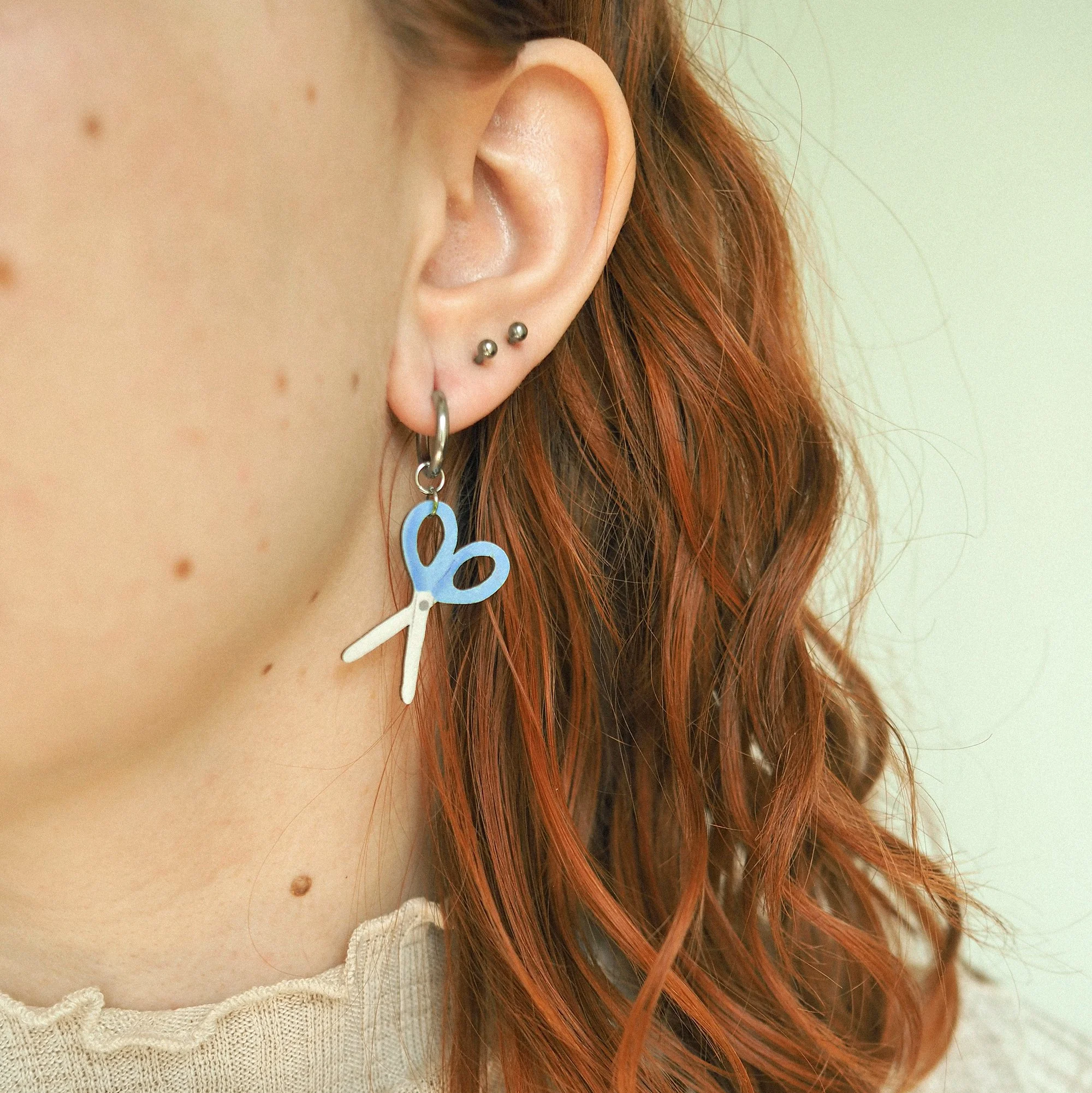 blue scissors wearing square small.jpg