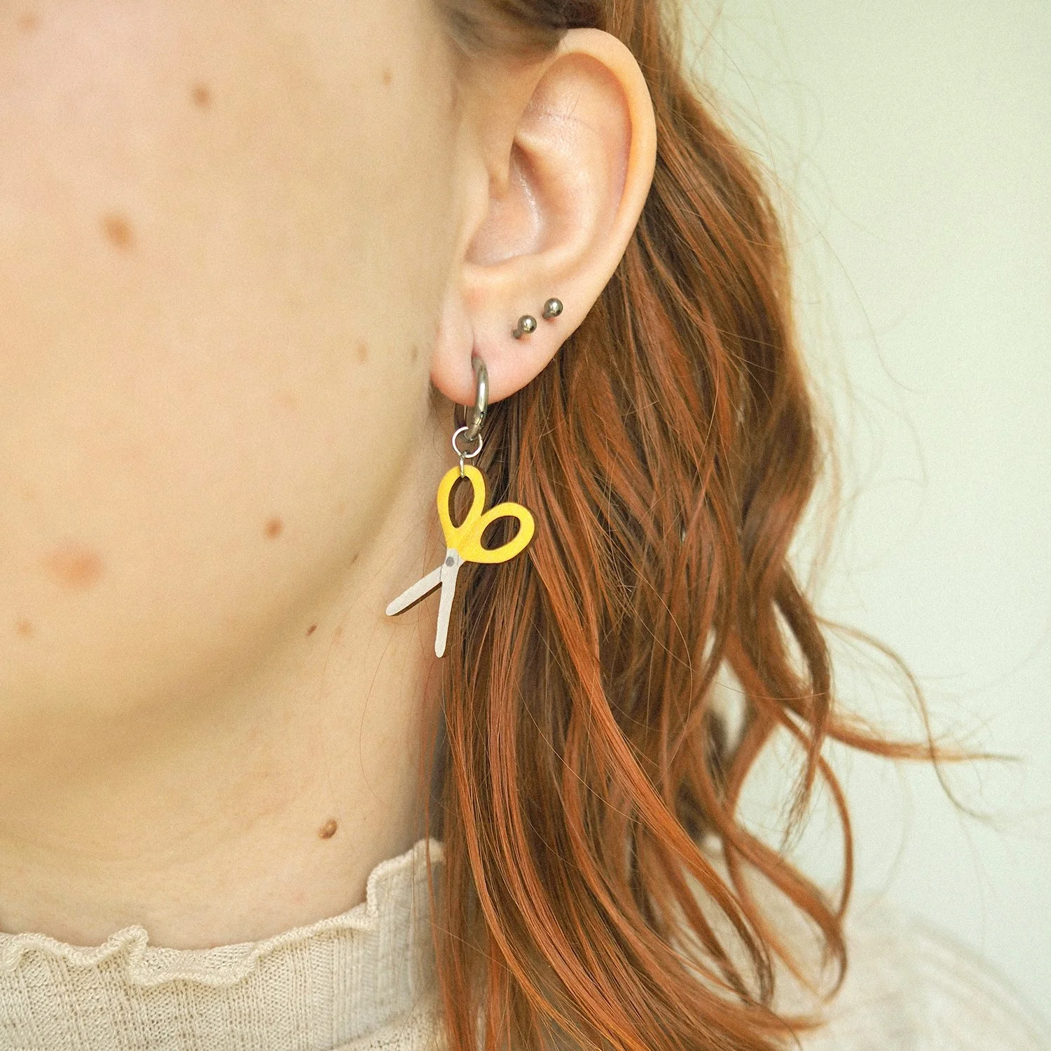 yellow scissors wearing.jpg