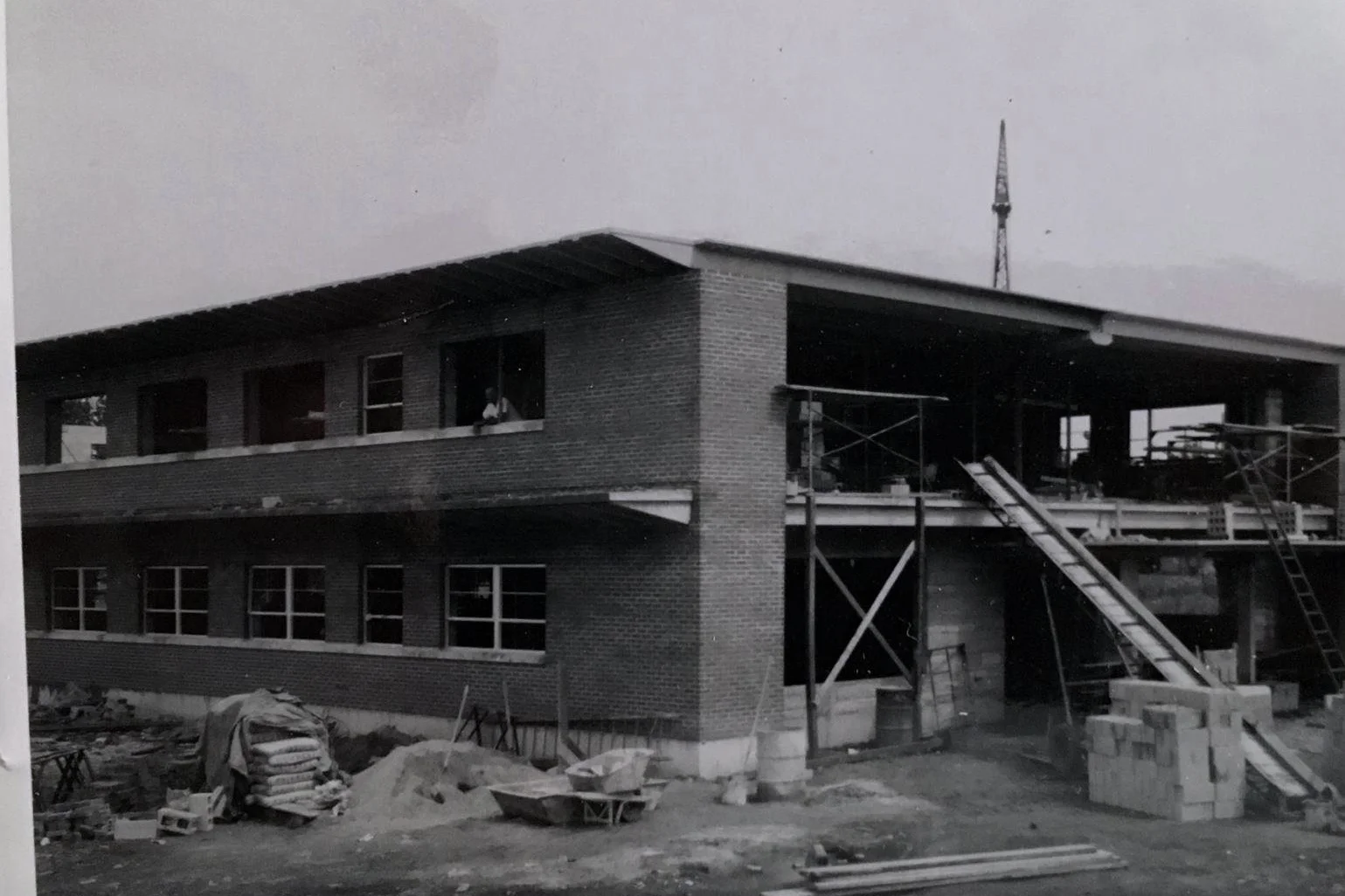 The Johnson, Depp & Quisenberry building under construction in June of 1958. This view is looking at the front north-west corner of the building.
