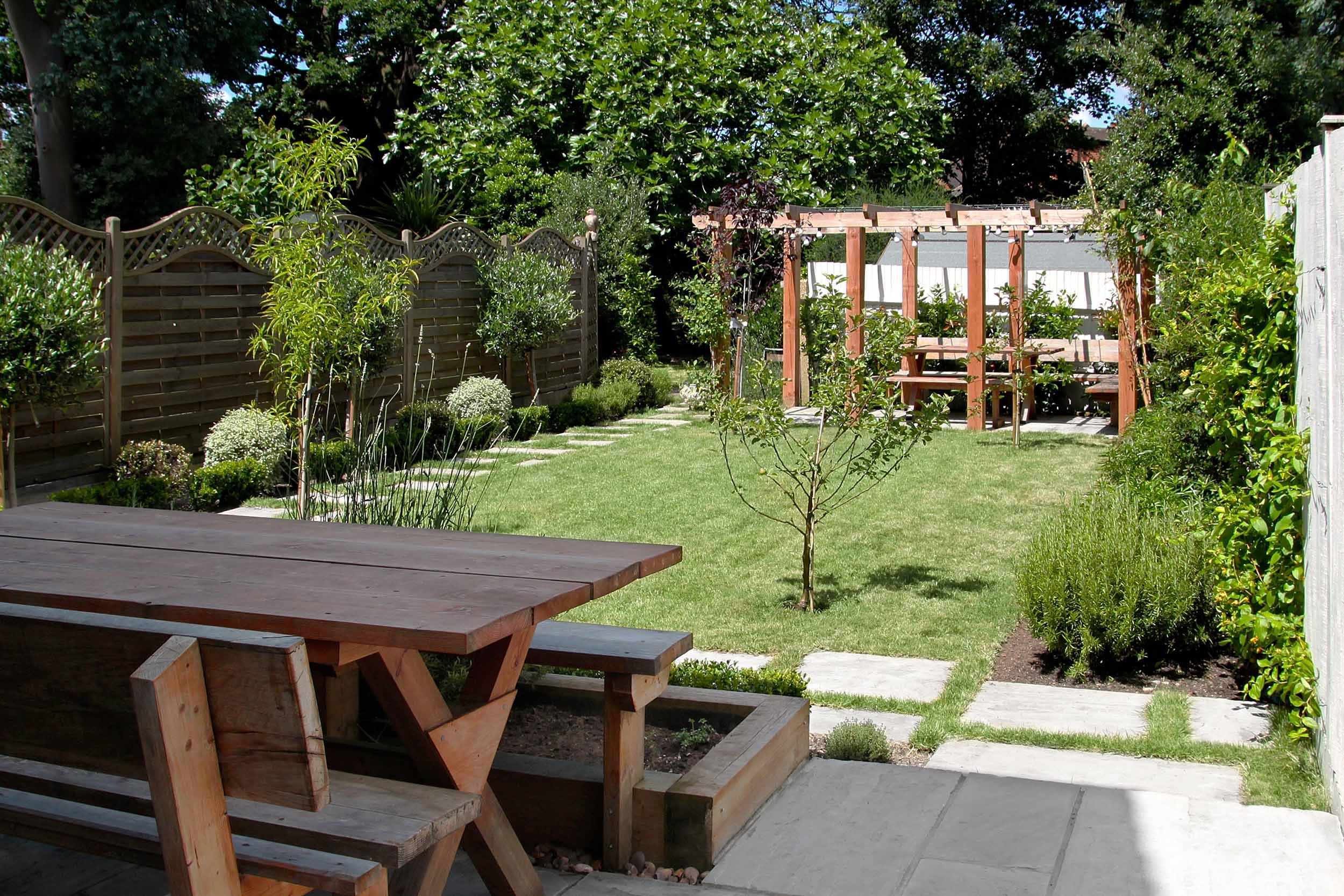 Reclaimed timber garden furniture, timber pergola. Garden design &amp; build near Farnham, Surrey