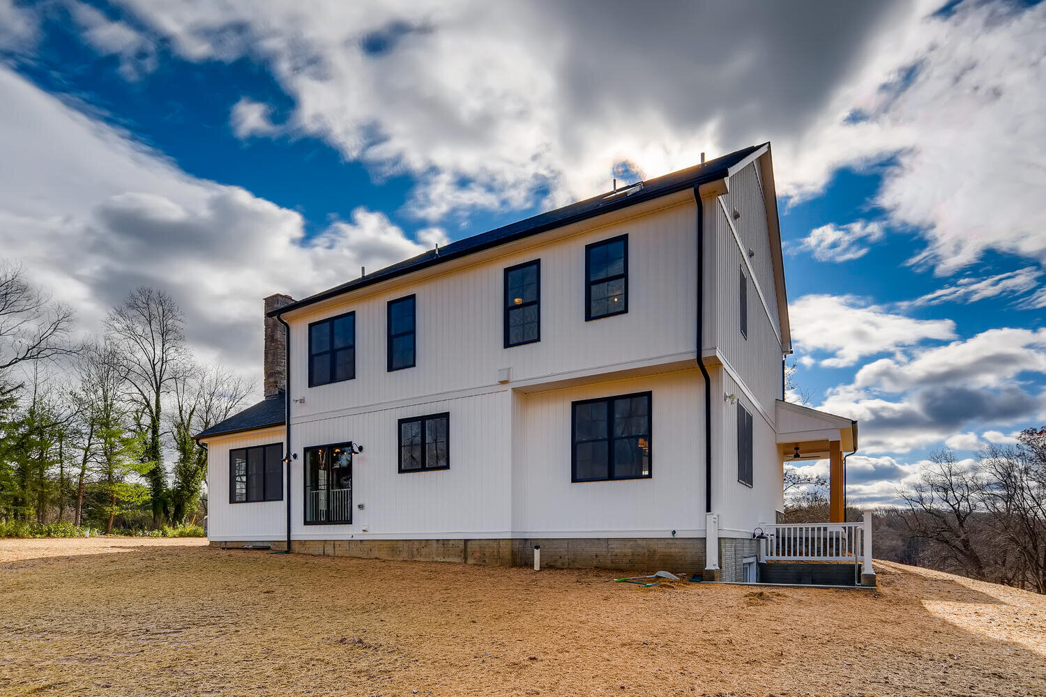 rear-exterior-farm-house-fordham-new-custom-home.jpg