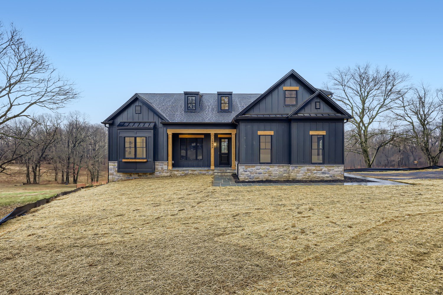 black-farm-house-with-cedar-accents.jpg