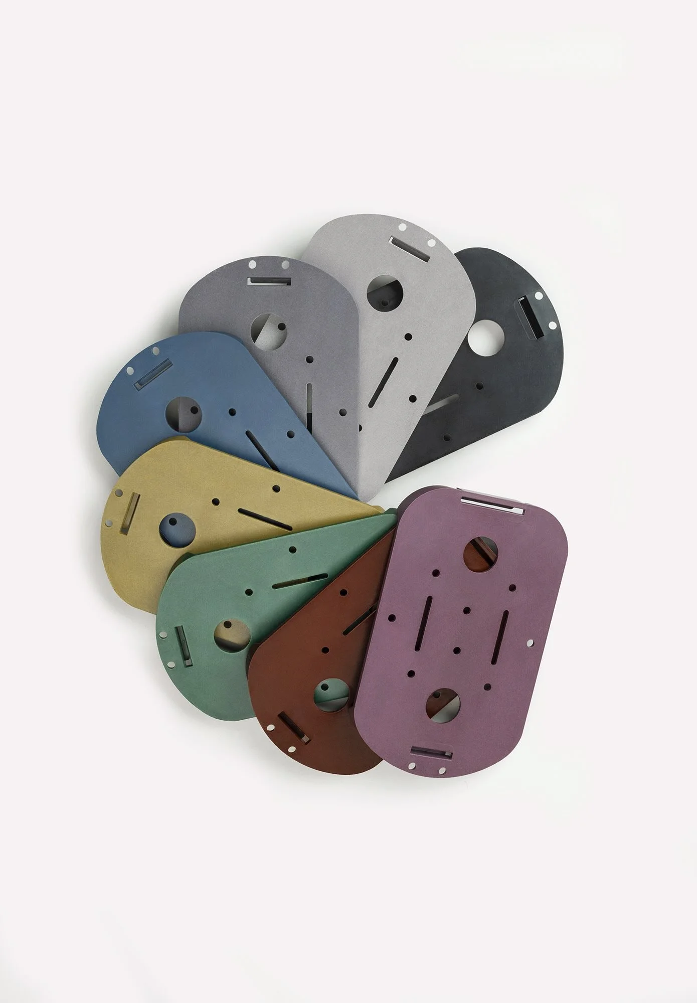 Set of injection moulded components in various colours, made from polypropylene containing Renol. Sustainable, CO₂-reducing and recyclable material. Lignin Industries.