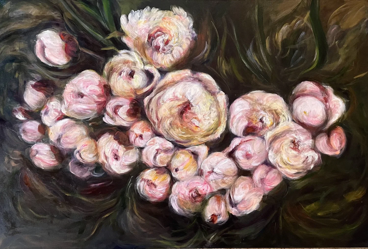 bouquet of white and pink flowers with dark background