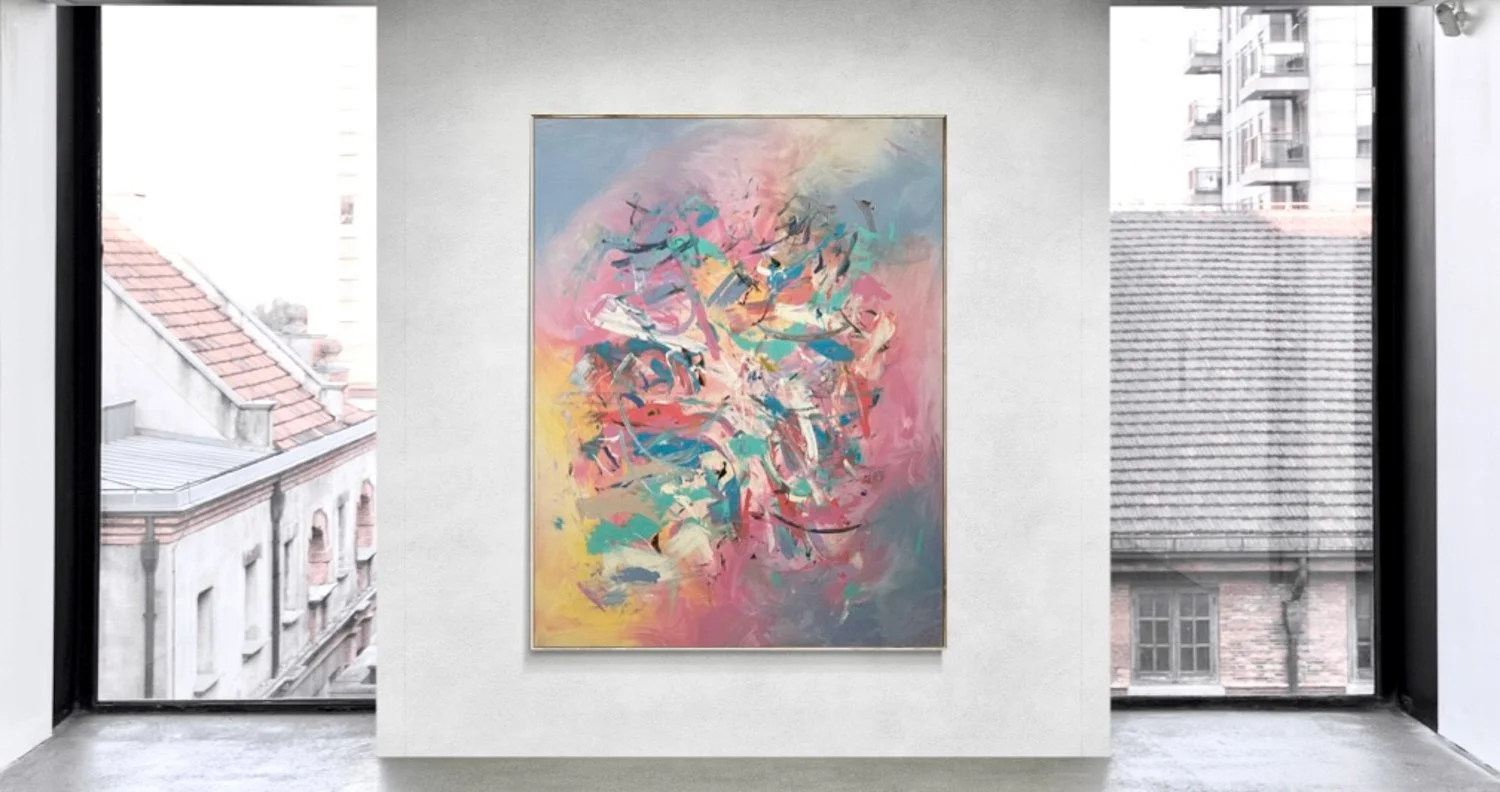 abstract painting hanging on wall