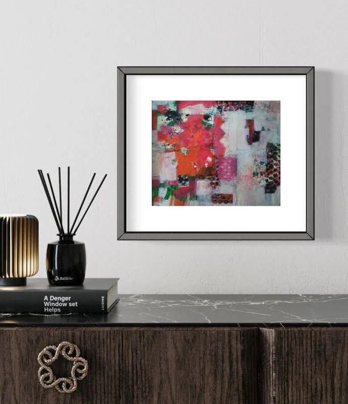 Building Blocks framed in dark frame on wall