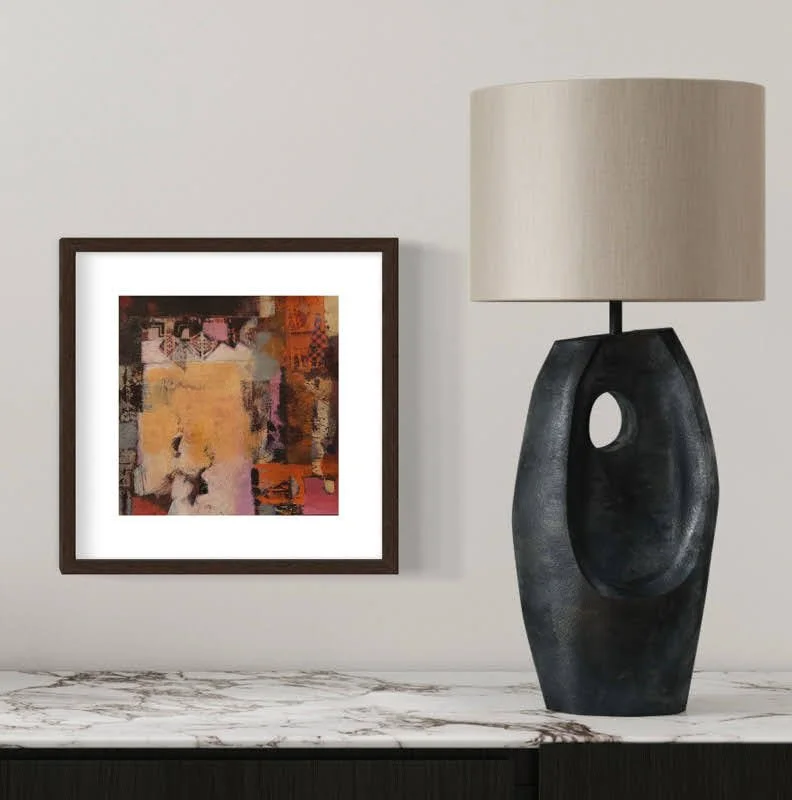 Reckless Sun artwork with matted in white, framed in black, hanging on wall