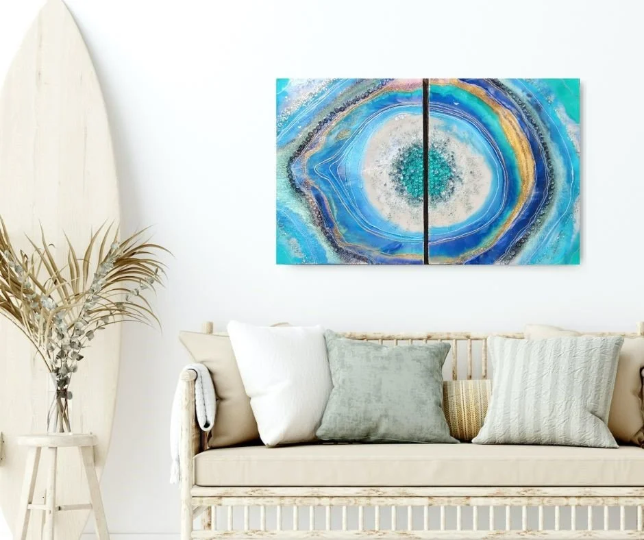 Deep Blue artwork hanging on wall above sofa
