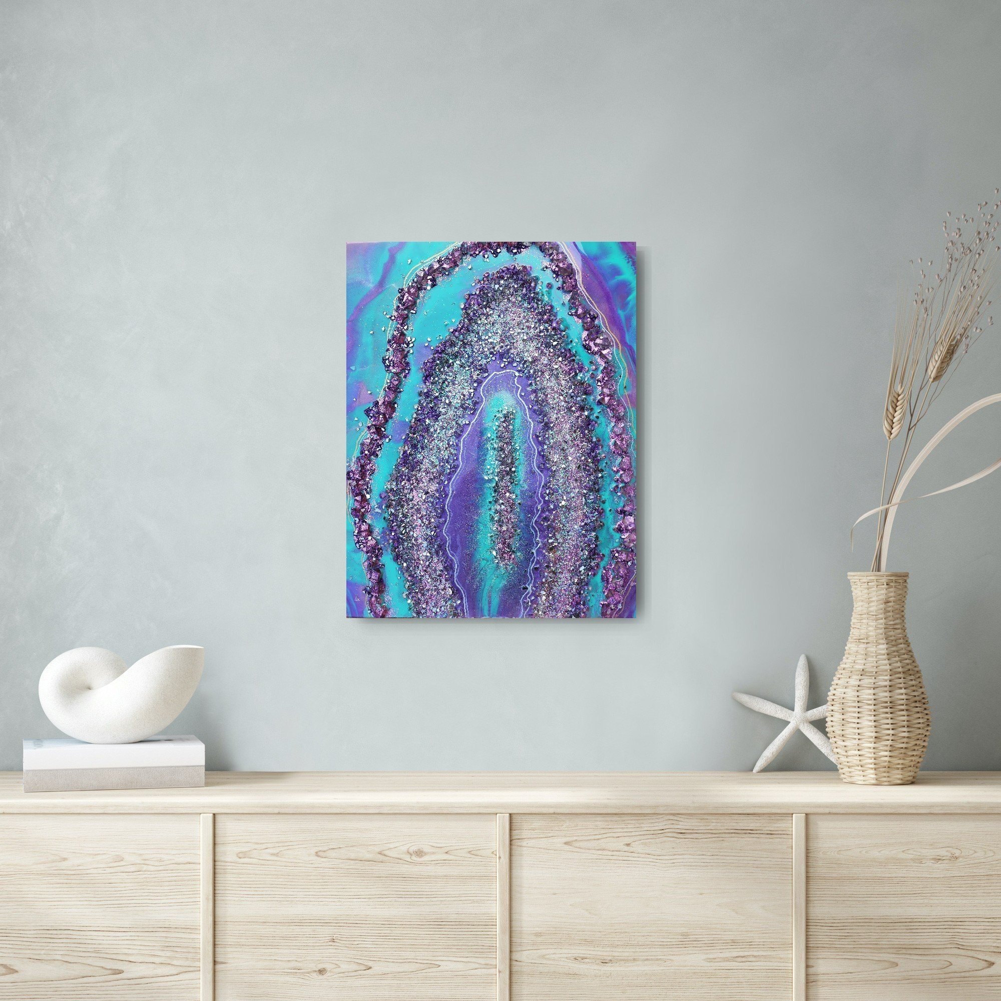 Majestic Sparkle artwork hanging on gray wall over cabinet