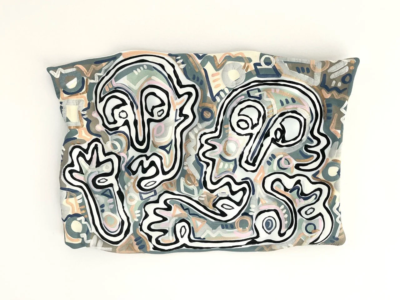 Abstract faces with shades of tan, black and slate blue