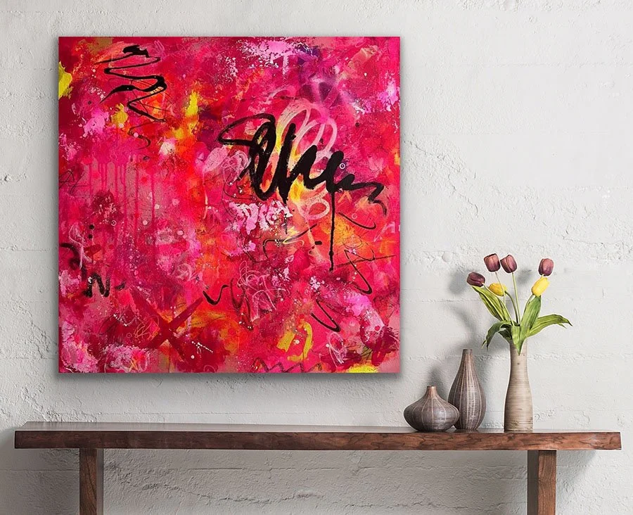 All the Joy Art hanging on wall above side table