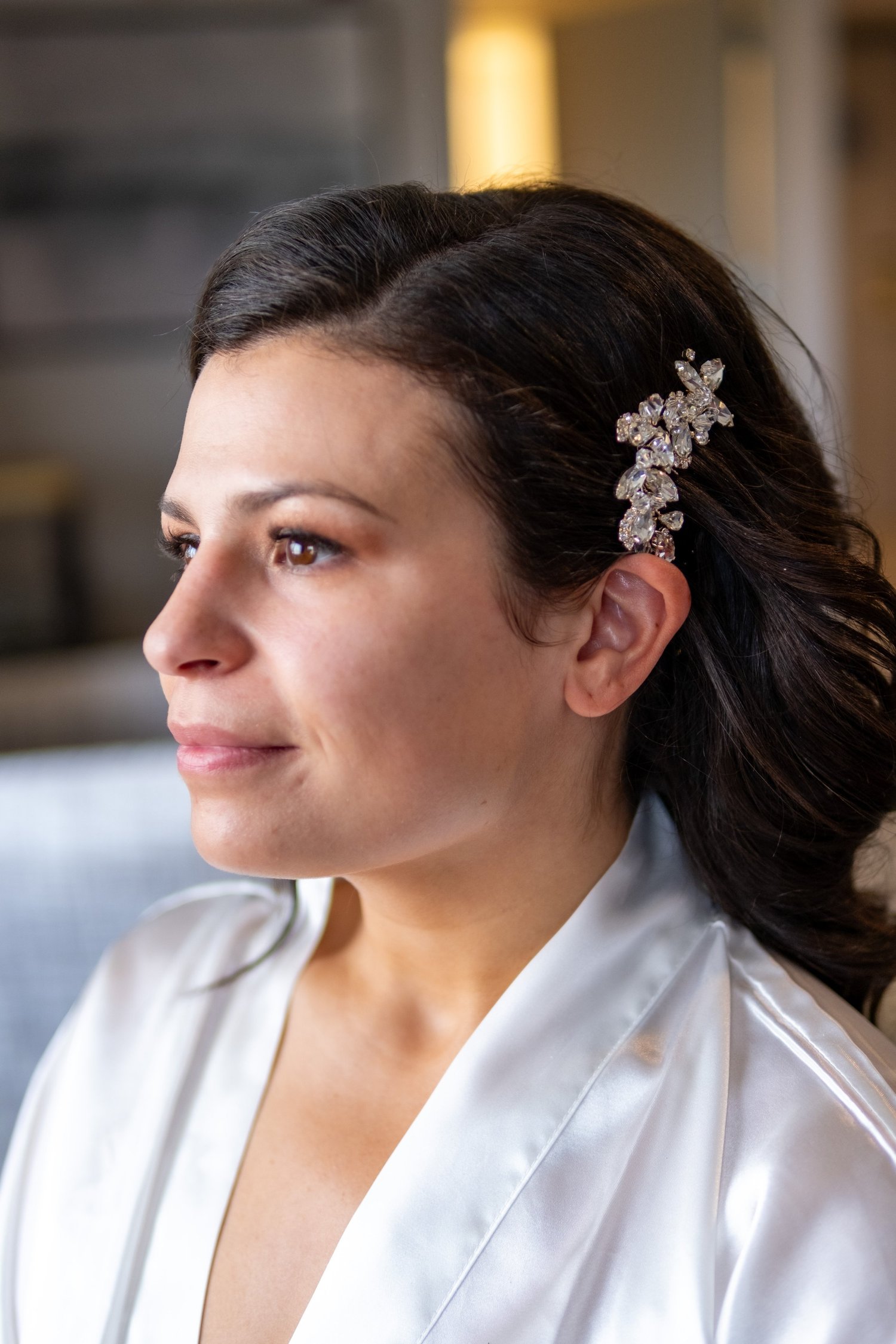 Nicole with her crystal hairpiece during getting ready at Portland Sheraton at Sable Oaks South Portland Maine summer wedding photography VMG Productions