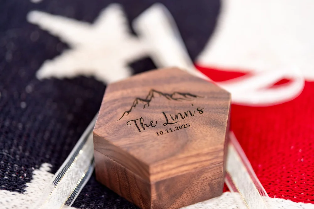 Meagan and Joshua engraved wooden ring box at The Watson Homestead Hiram Maine fall wedding photography VMG Productions