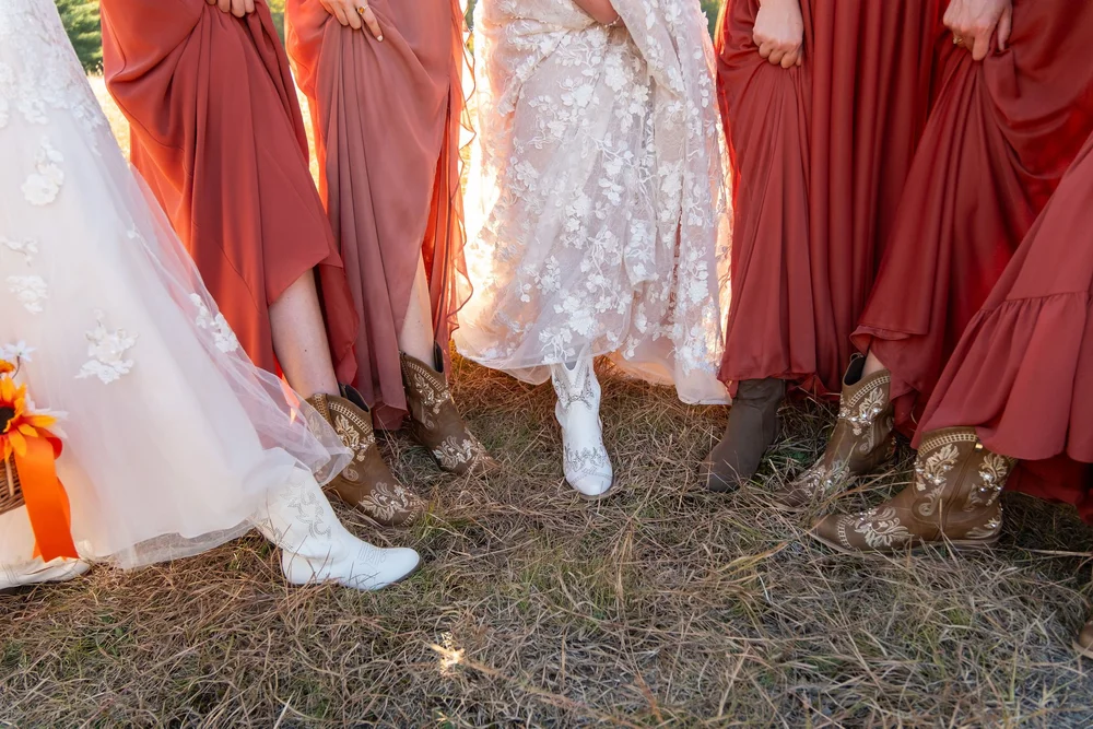 Meagan and bridesmaids embroidered boots detail at The Watson Homestead Hiram Maine fall wedding photography VMG Productions