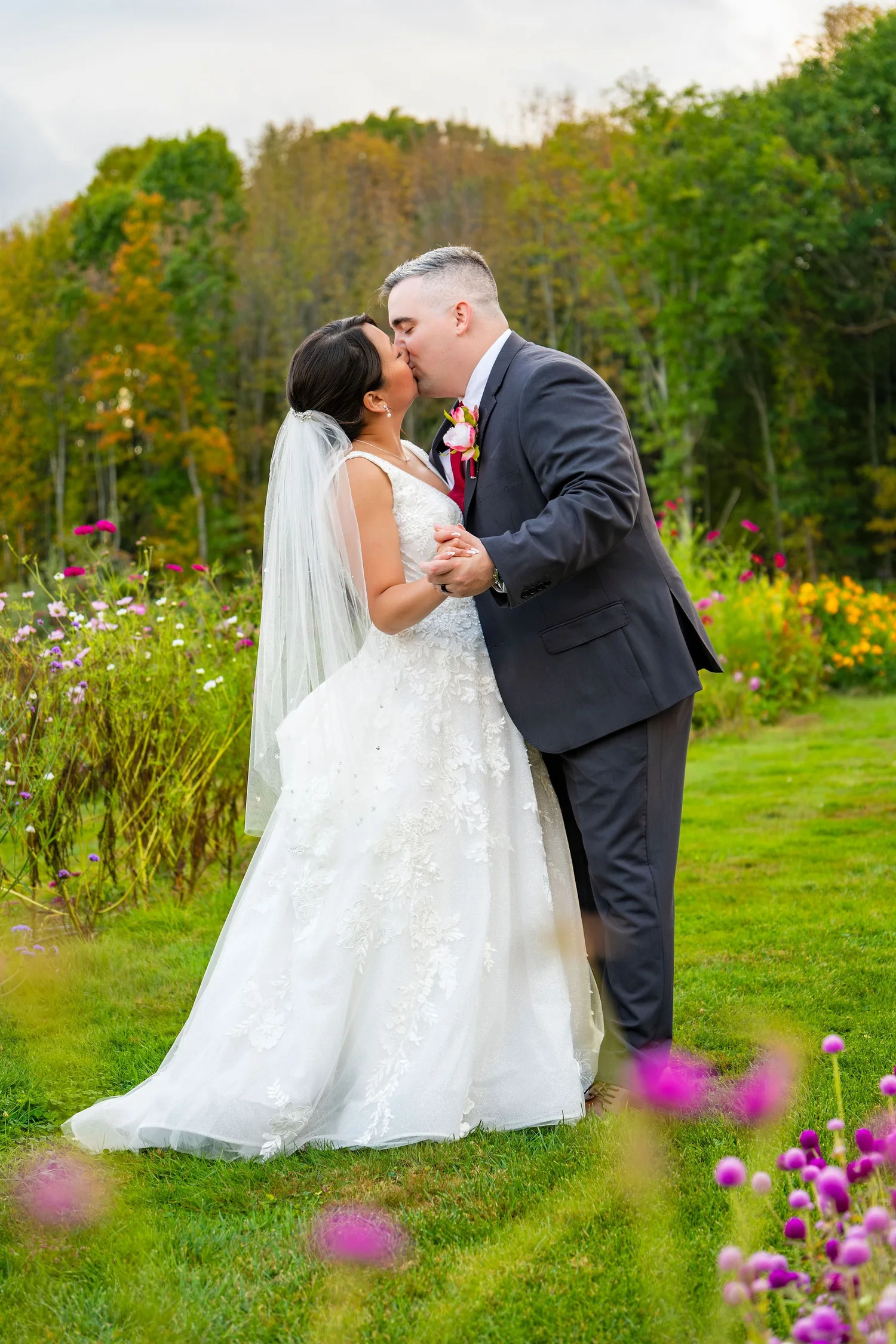 Couple portrait with fall foliage at Harvest Moon Farm in Winthrop Maine