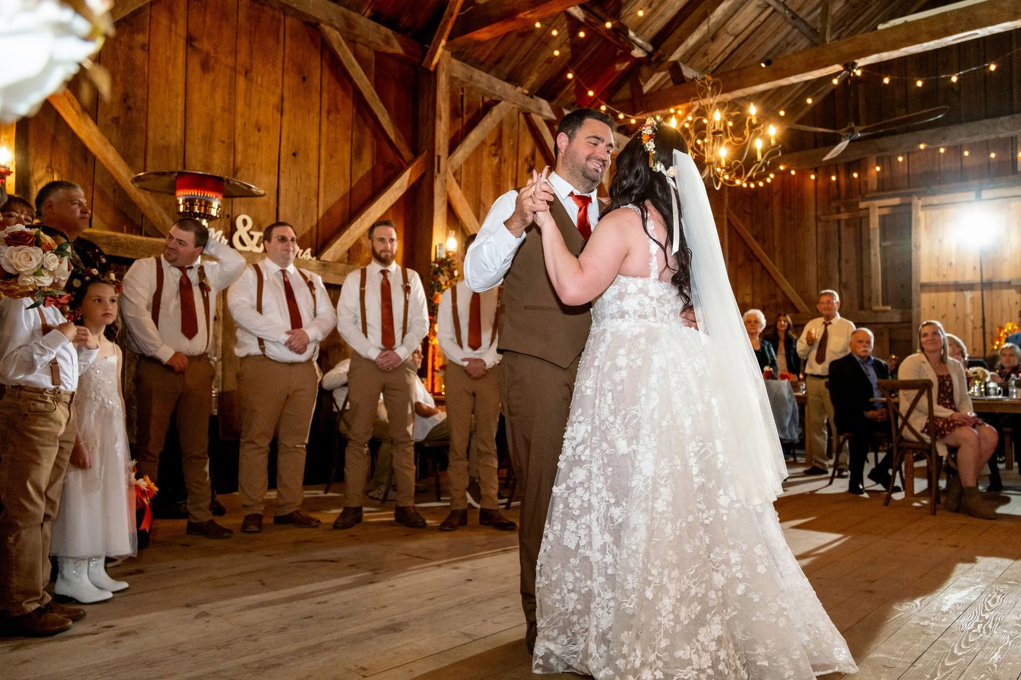 Meagan and Joshua first dance in rustic barn at The Watson Homestead Hiram Maine fall wedding photography VMG Productions