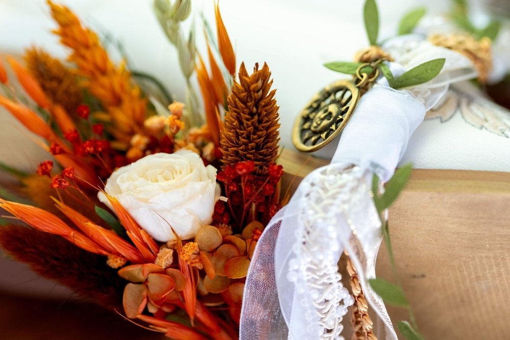 Meagan and Joshua fall bouquet and handfasting detail at The Watson Homestead Hiram Maine fall wedding photography VMG Productions