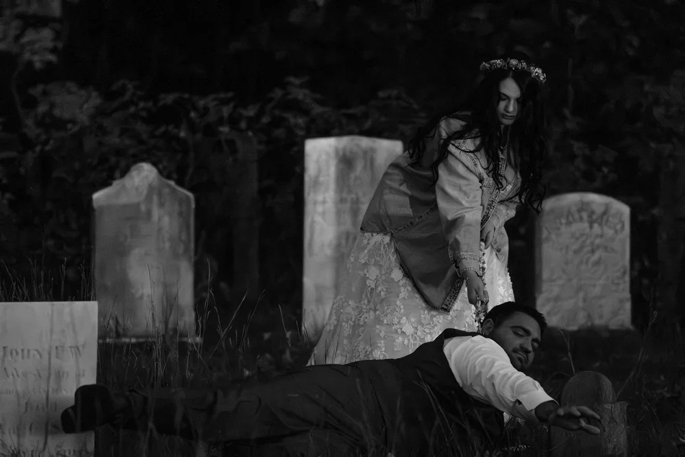 Meagan and Joshua playful black and white cemetery portrait at The Watson Homestead Hiram Maine fall wedding photography VMG Productions