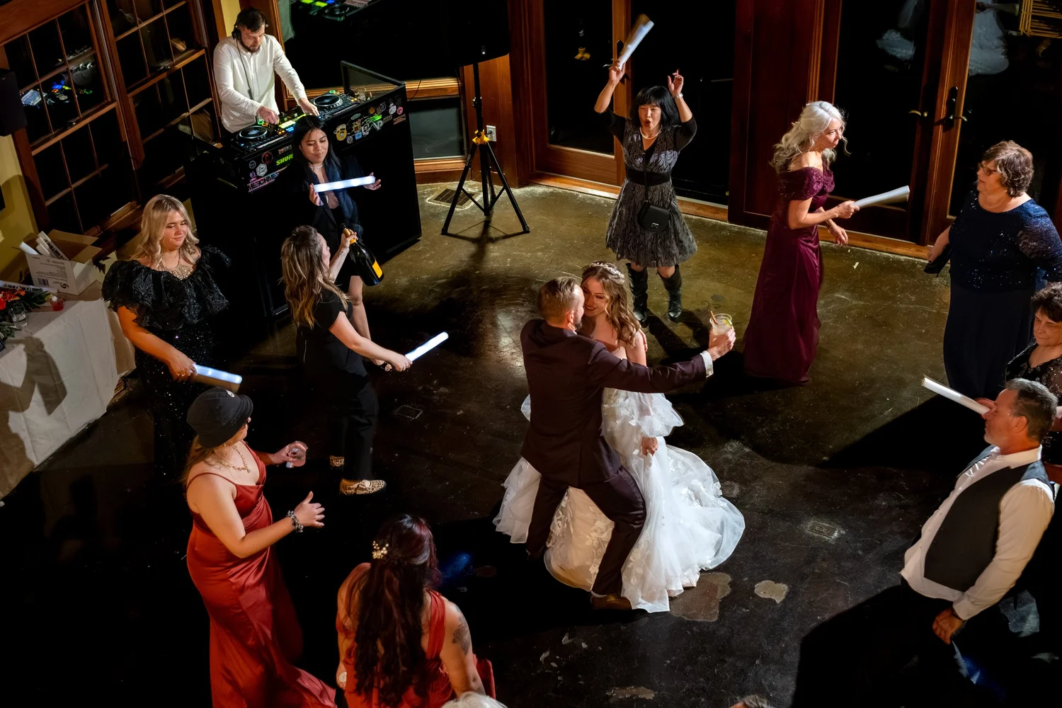 Aerial view reception dance floor glow sticks DJ SkiEsta lodge Newry Maine fall wedding party VMG Productions