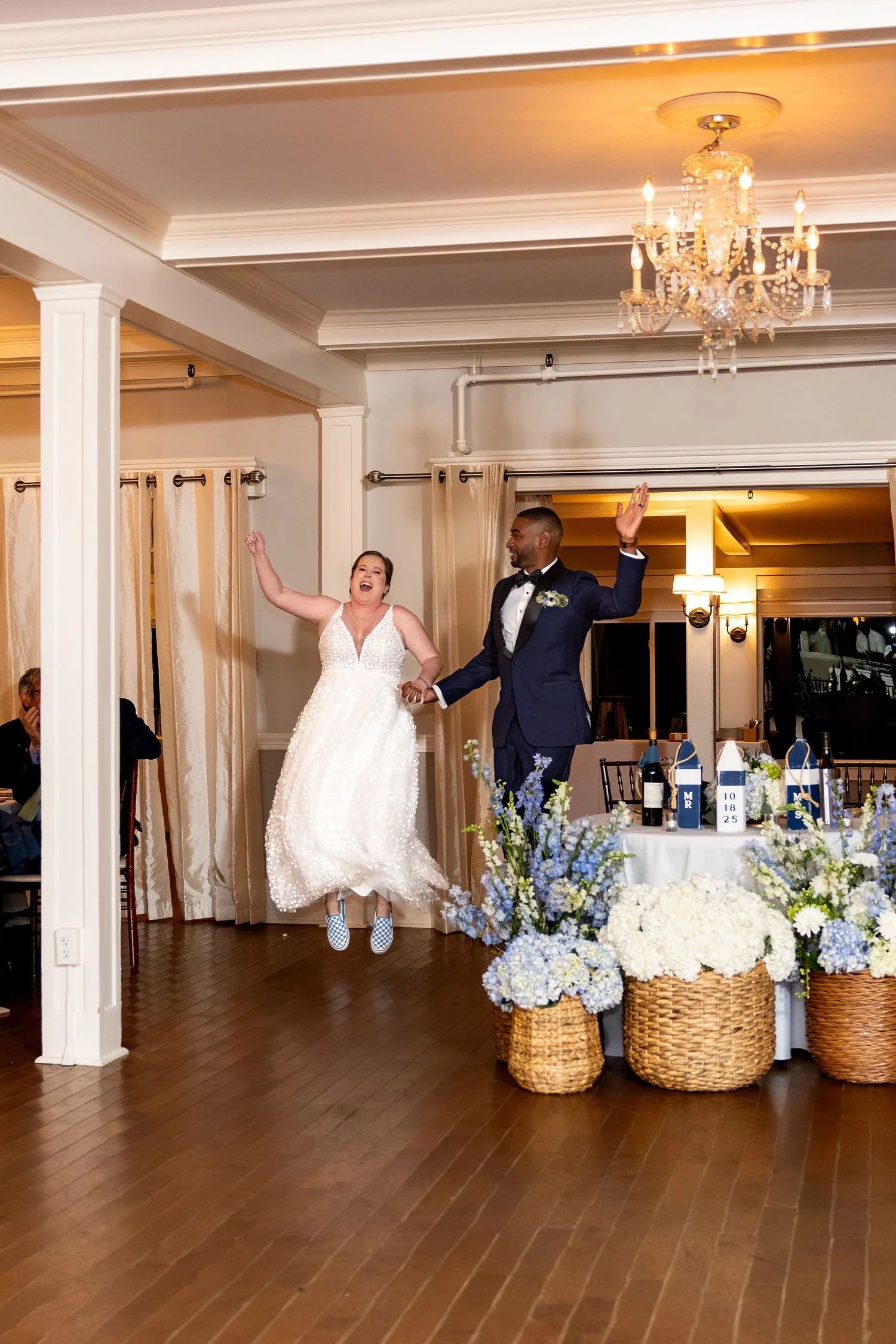 Kaitlyn and Darren jumping celebrating grand entrance at reception Nonantum Resort Kennebunkport Maine fall wedding VMG Productions